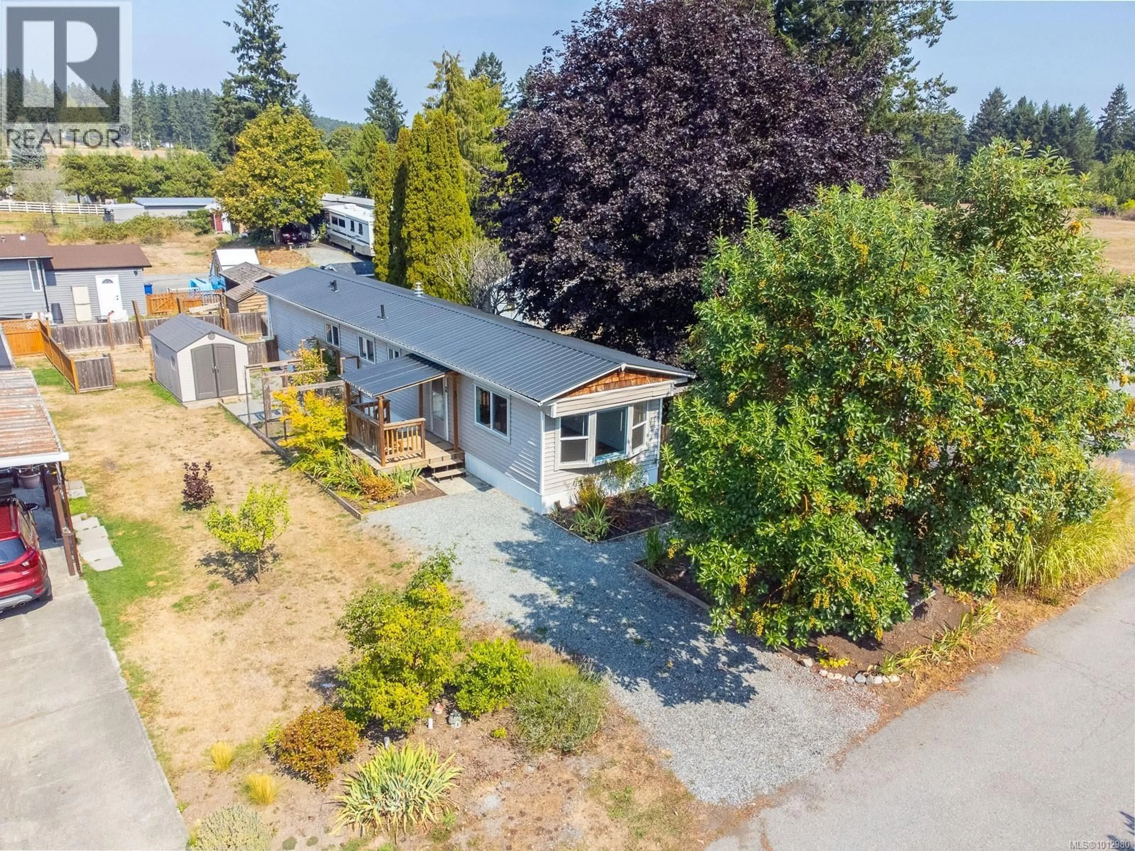 A pic from outside/outdoor area/front of a property/back of a property/a pic from drone, street for 42 - 1572 SEABIRD ROAD, Nanaimo British Columbia V9G1L3