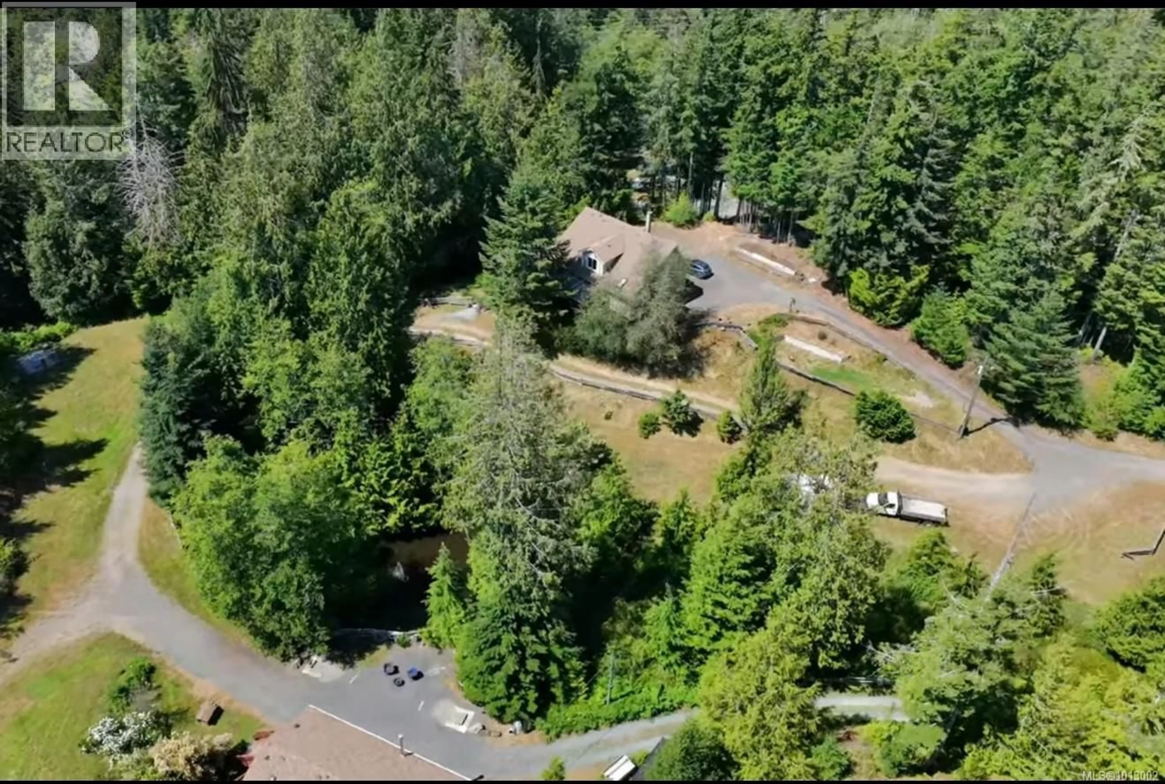 A pic from outside/outdoor area/front of a property/back of a property/a pic from drone, forest/trees view for 8035 TUGWELL ROAD, Sooke British Columbia V9Z0J8