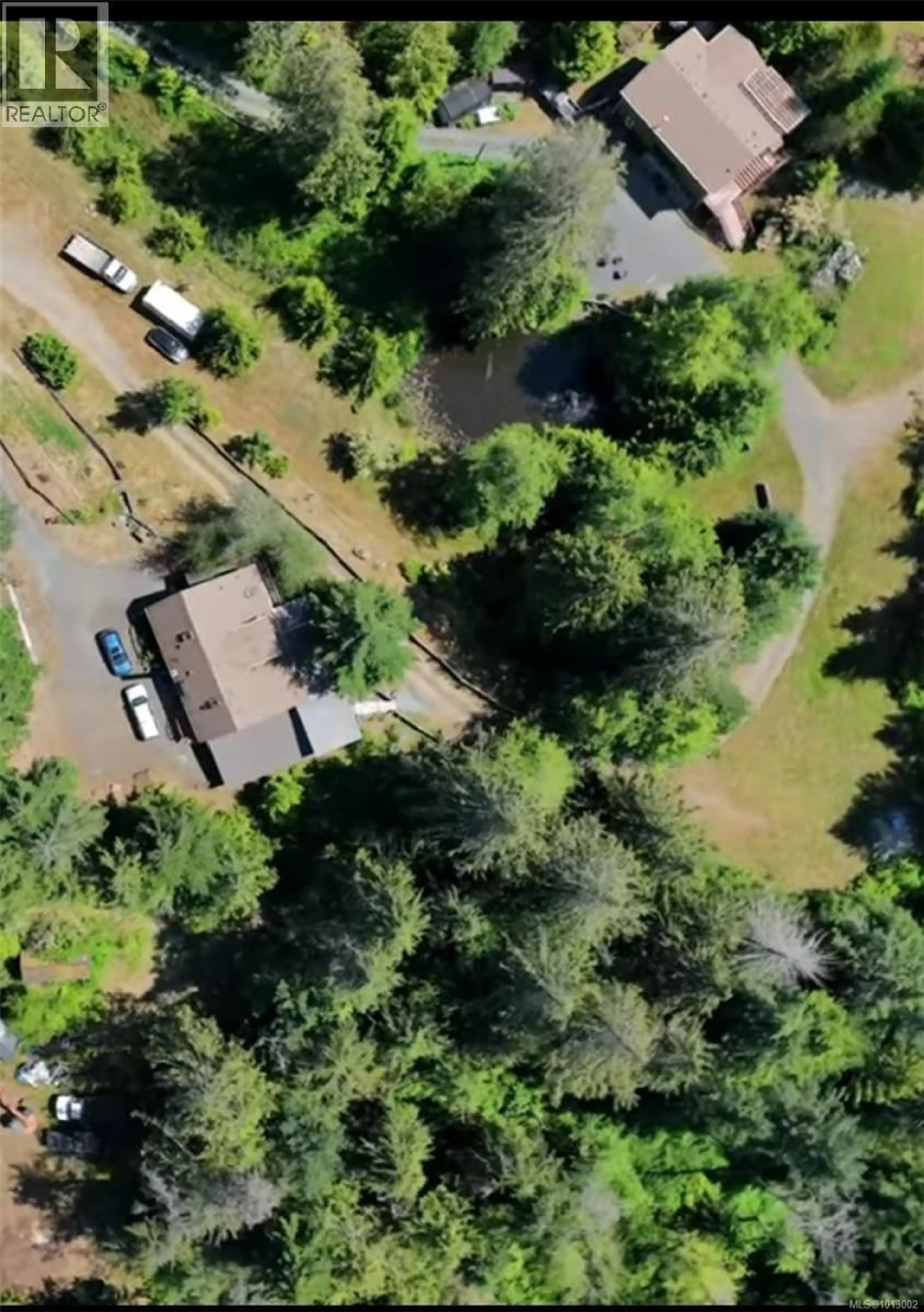 A pic from outside/outdoor area/front of a property/back of a property/a pic from drone, forest/trees view for 8035 TUGWELL ROAD, Sooke British Columbia V9Z0J8