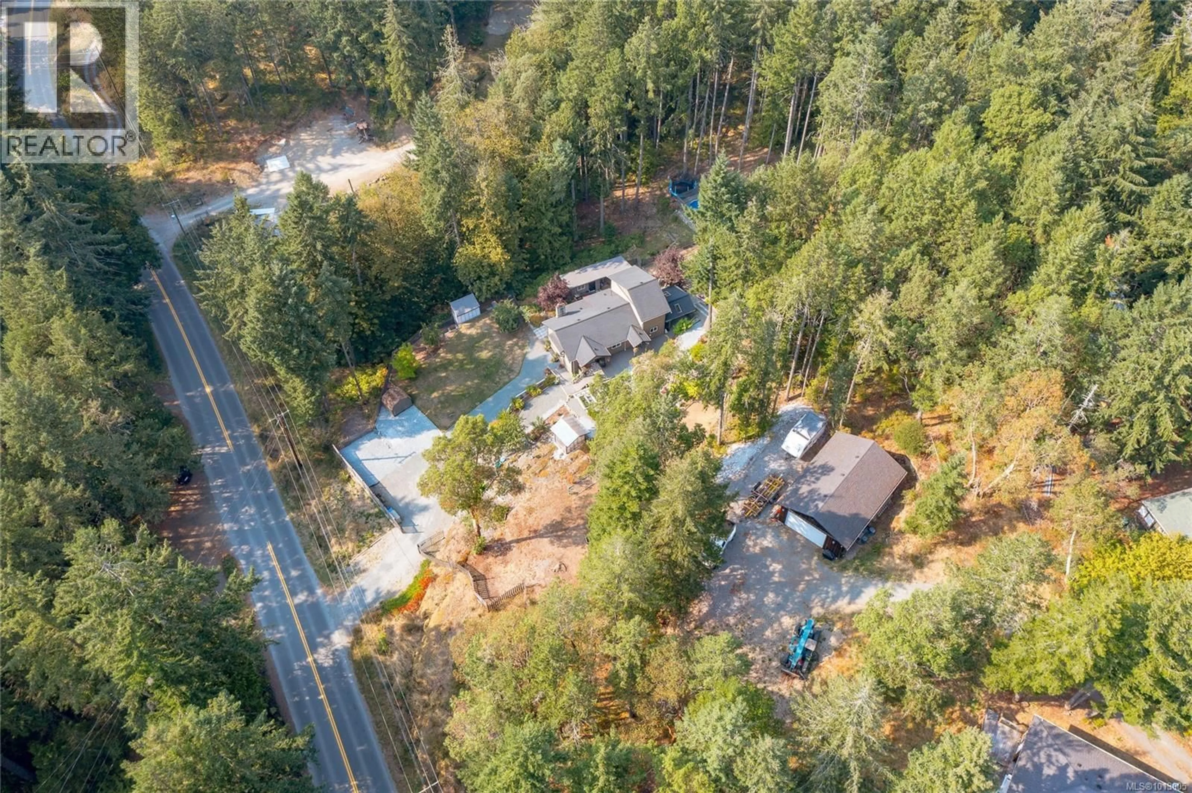 A pic from outside/outdoor area/front of a property/back of a property/a pic from drone, forest/trees view for 2411 RENFREW ROAD, Shawnigan Lake British Columbia V0R2W0