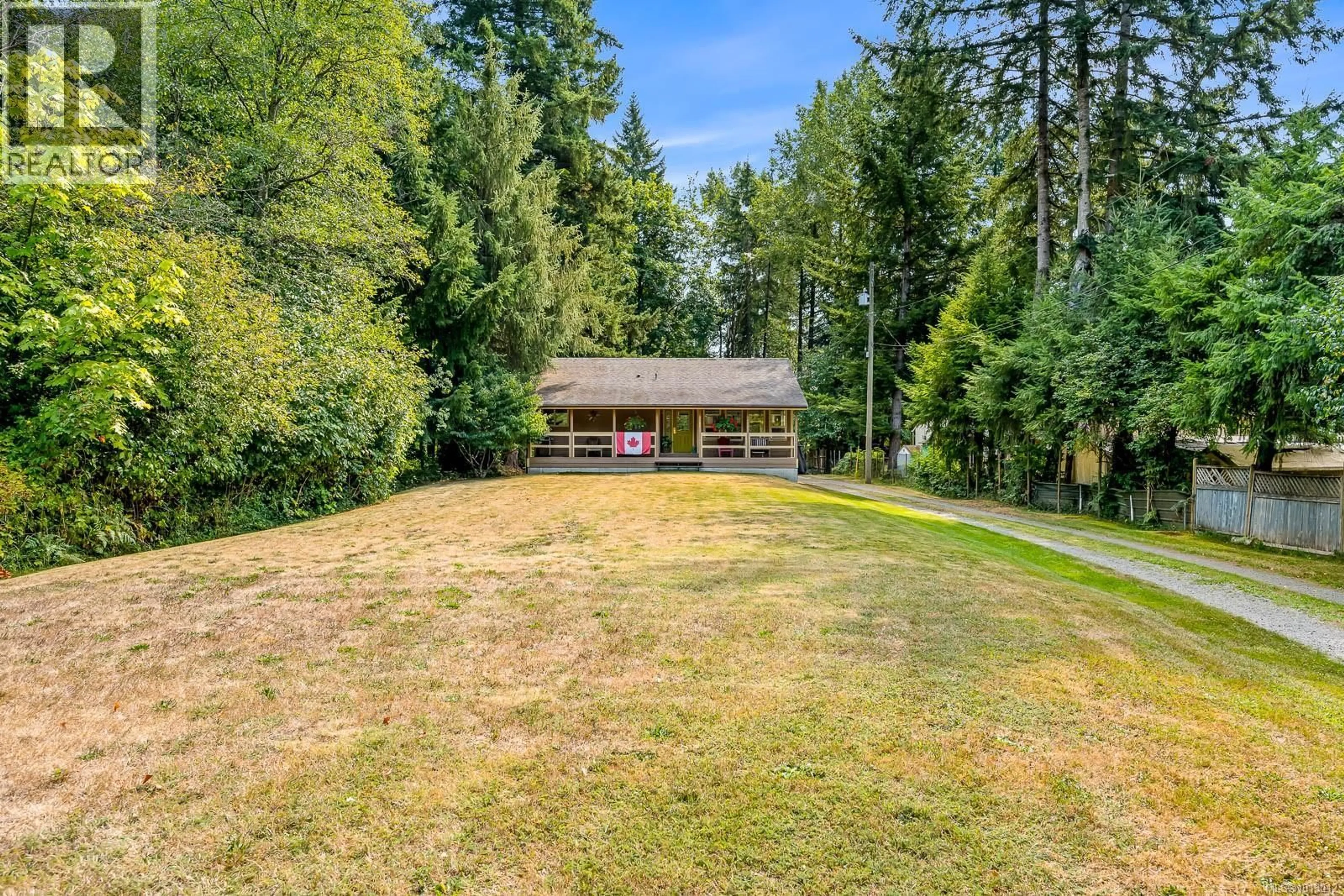 A pic from outside/outdoor area/front of a property/back of a property/a pic from drone, forest/trees view for 3465 CESSFORD ROAD, Courtenay British Columbia V9J1R4