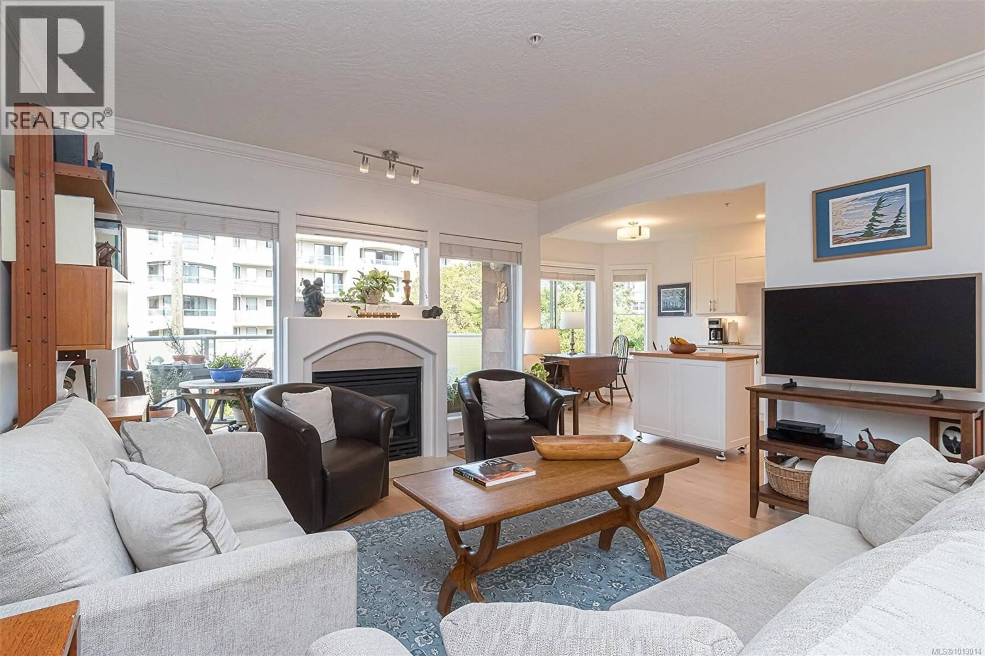 Living room with furniture, wood/laminate floor for 301 - 405 QUEBEC STREET, Victoria British Columbia V8V1W6