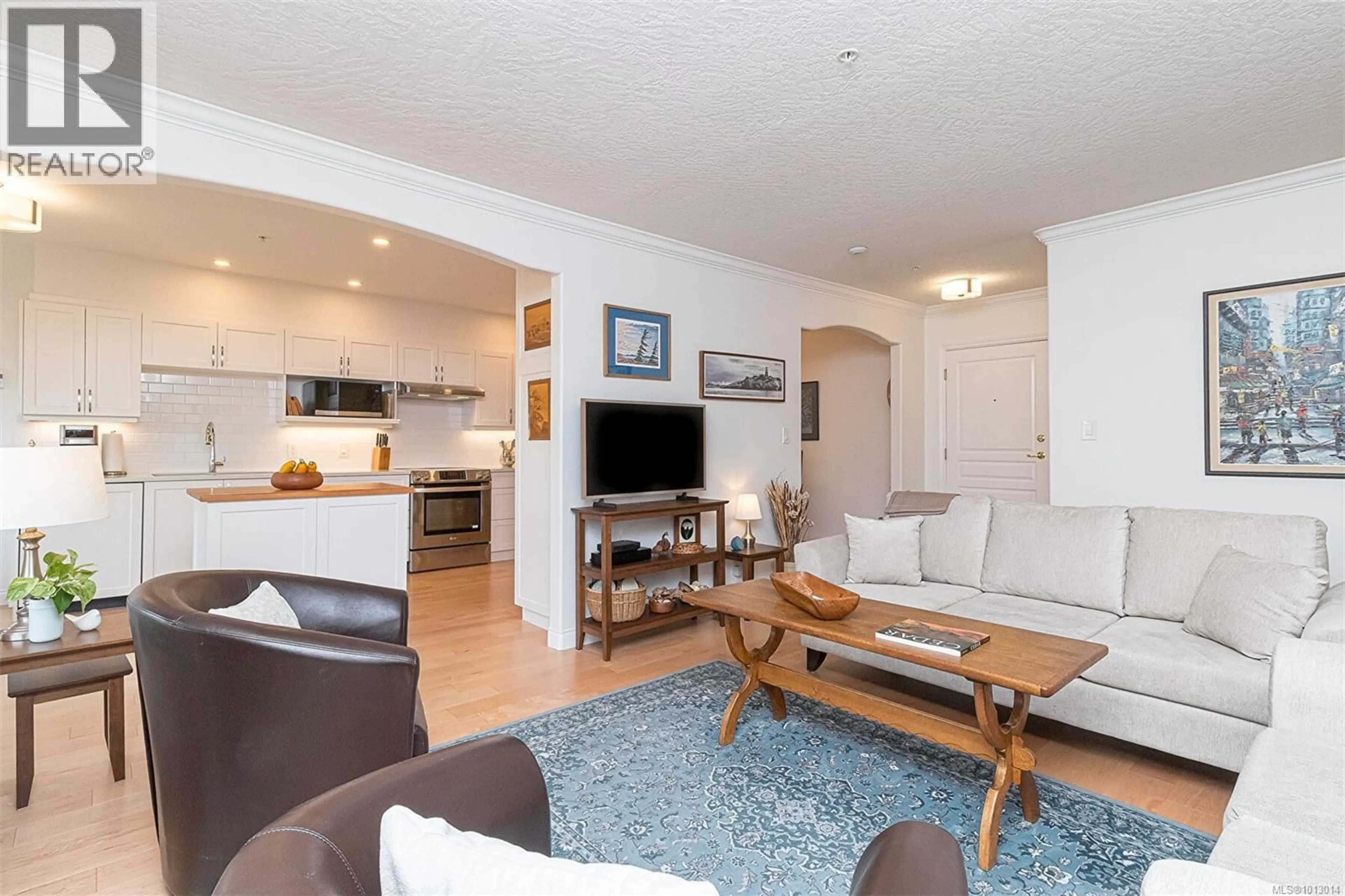 Living room with furniture, wood/laminate floor for 301 - 405 QUEBEC STREET, Victoria British Columbia V8V1W6