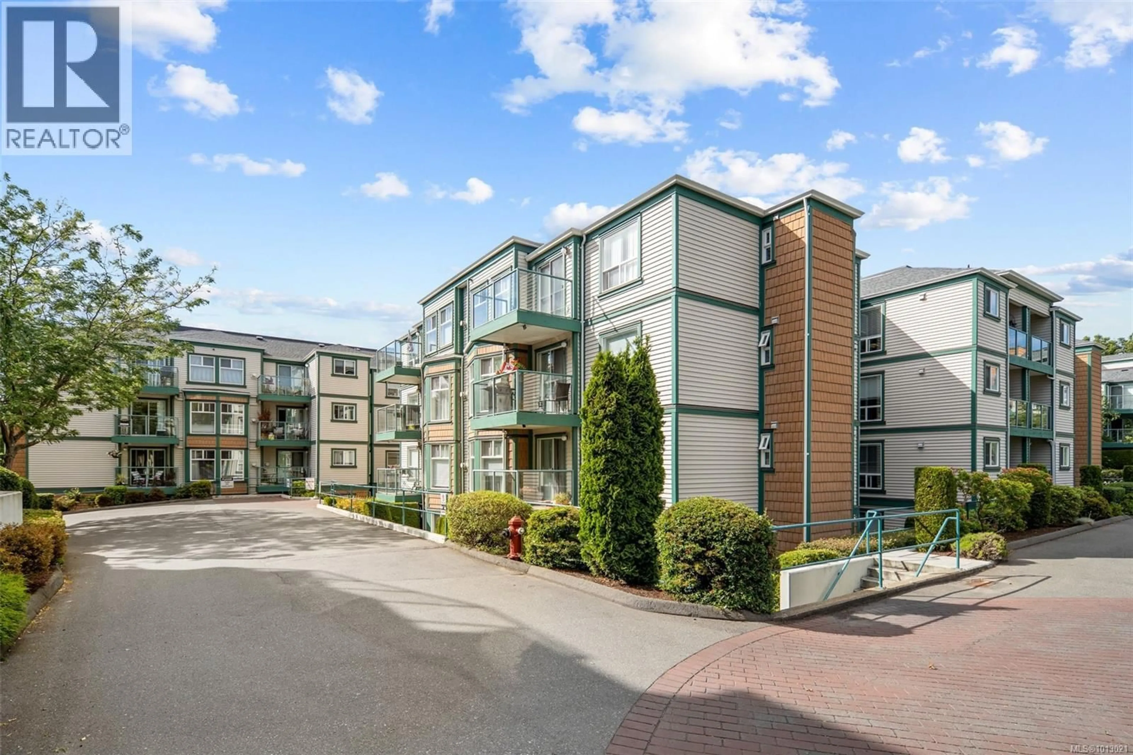 A pic from outside/outdoor area/front of a property/back of a property/a pic from drone, unknown for 103 - 894 VERNON AVENUE, Saanich British Columbia V8X2W6
