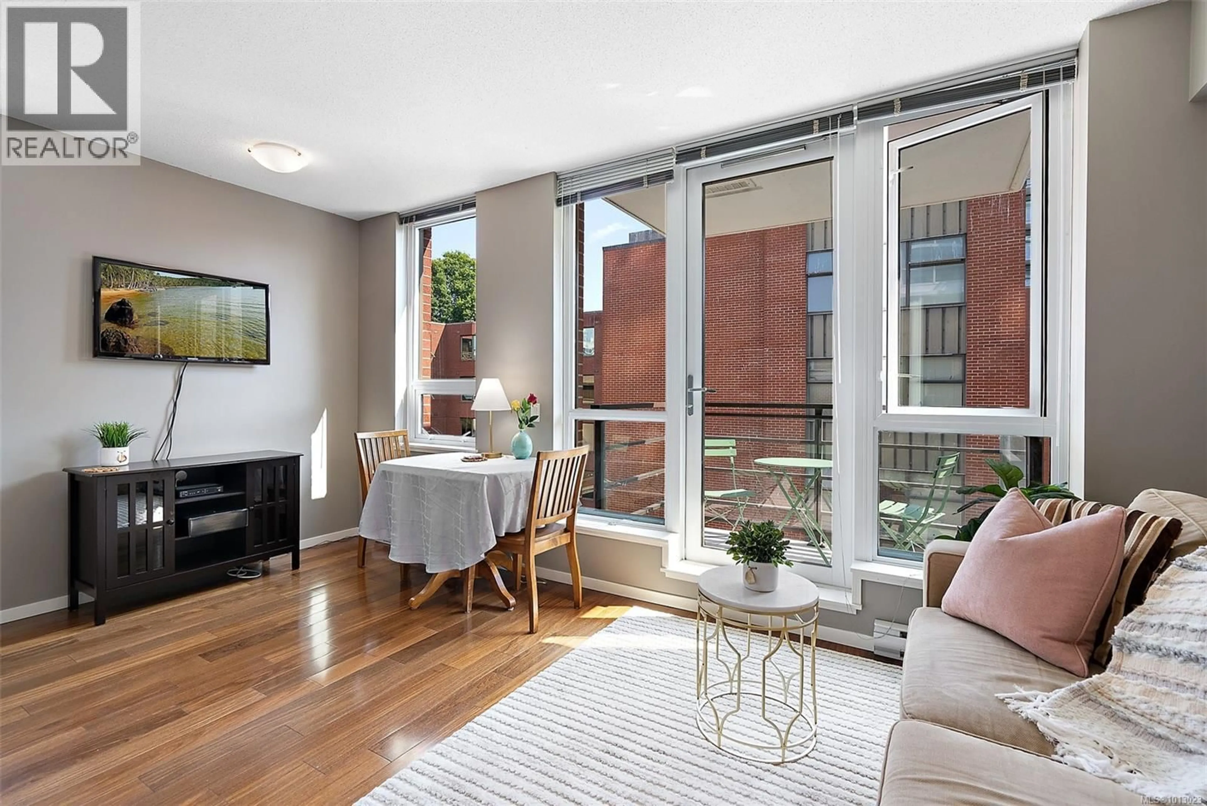 Living room with furniture, unknown for 410 - 834 JOHNSON STREET, Victoria British Columbia V8W1N3