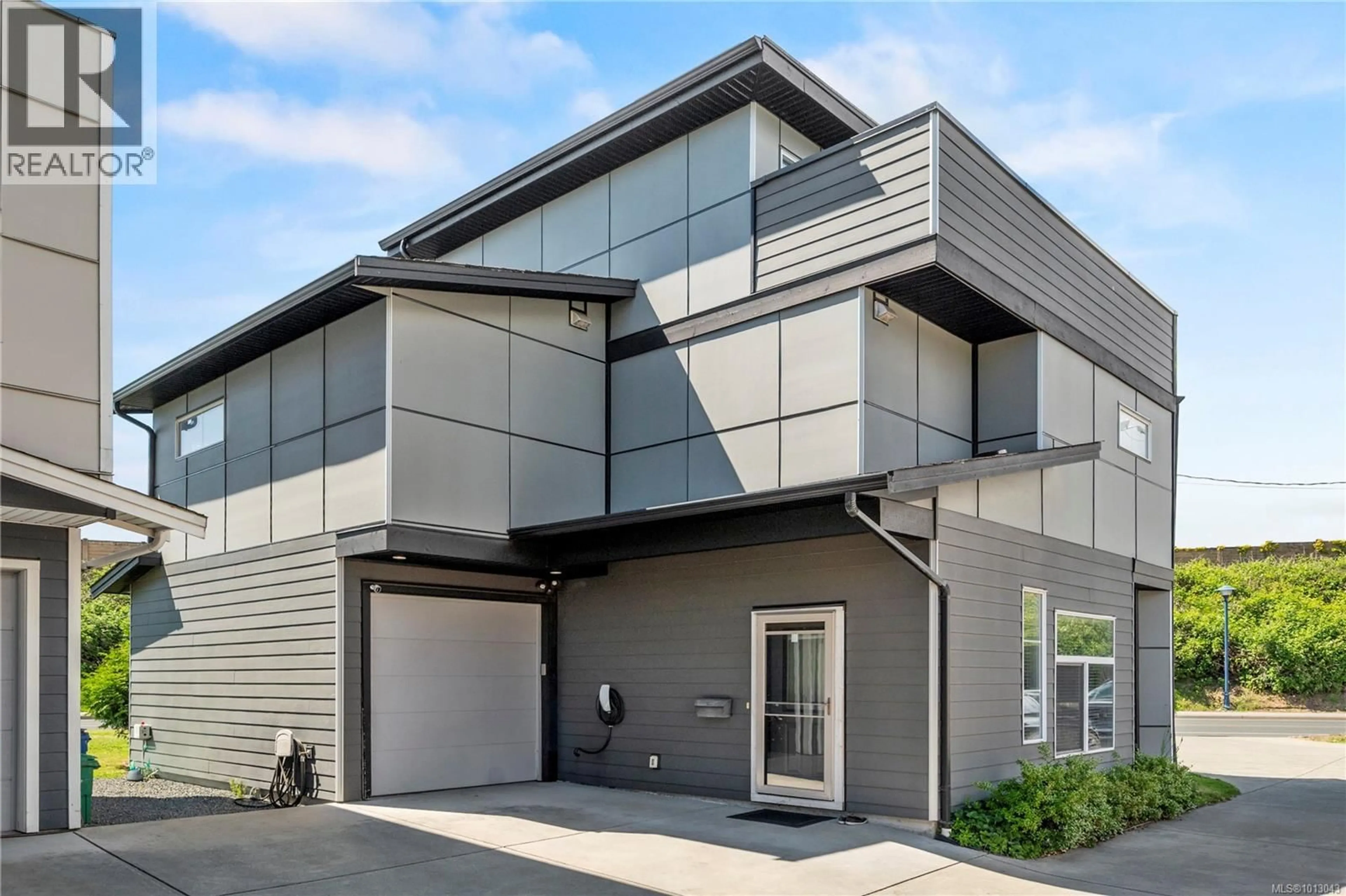 Home with vinyl exterior material, street for 701 STRANDLUND AVENUE, Langford British Columbia V9B3G2
