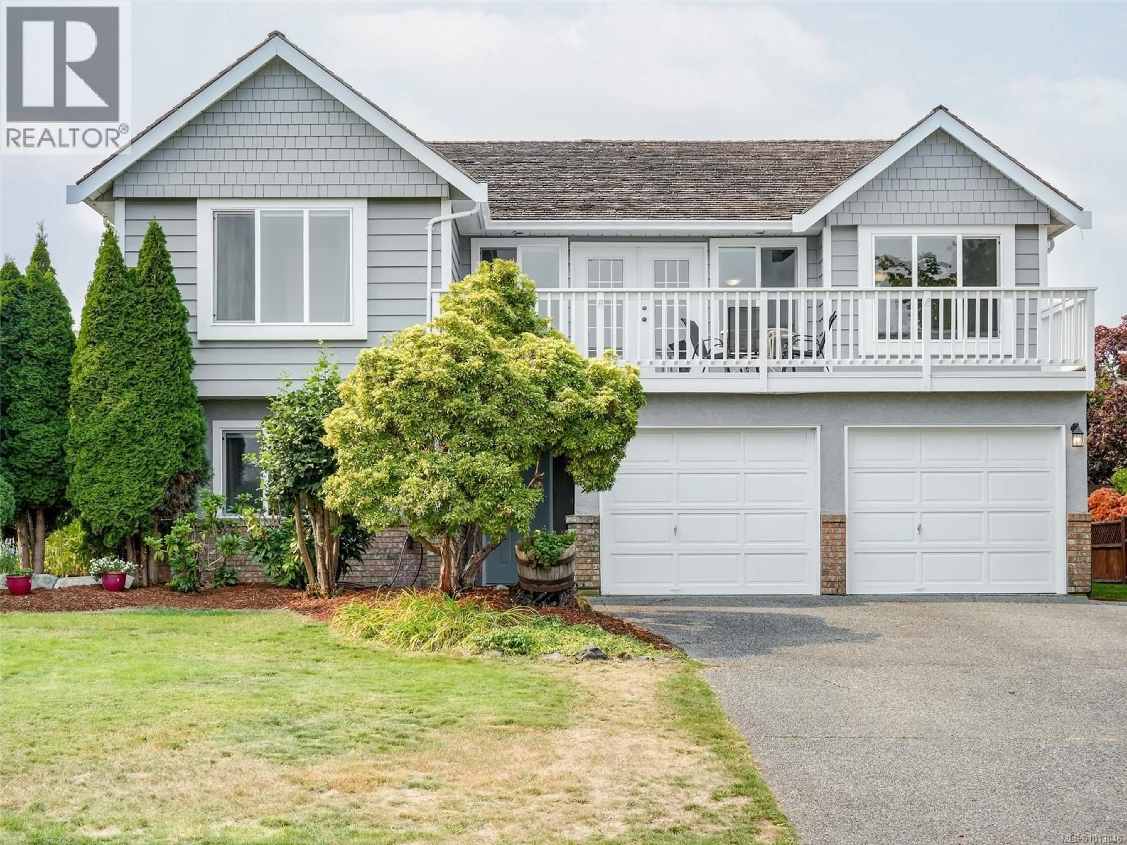 Home with vinyl exterior material, street for 2567 WILCOX TERRACE, Central Saanich British Columbia V8Z7G5