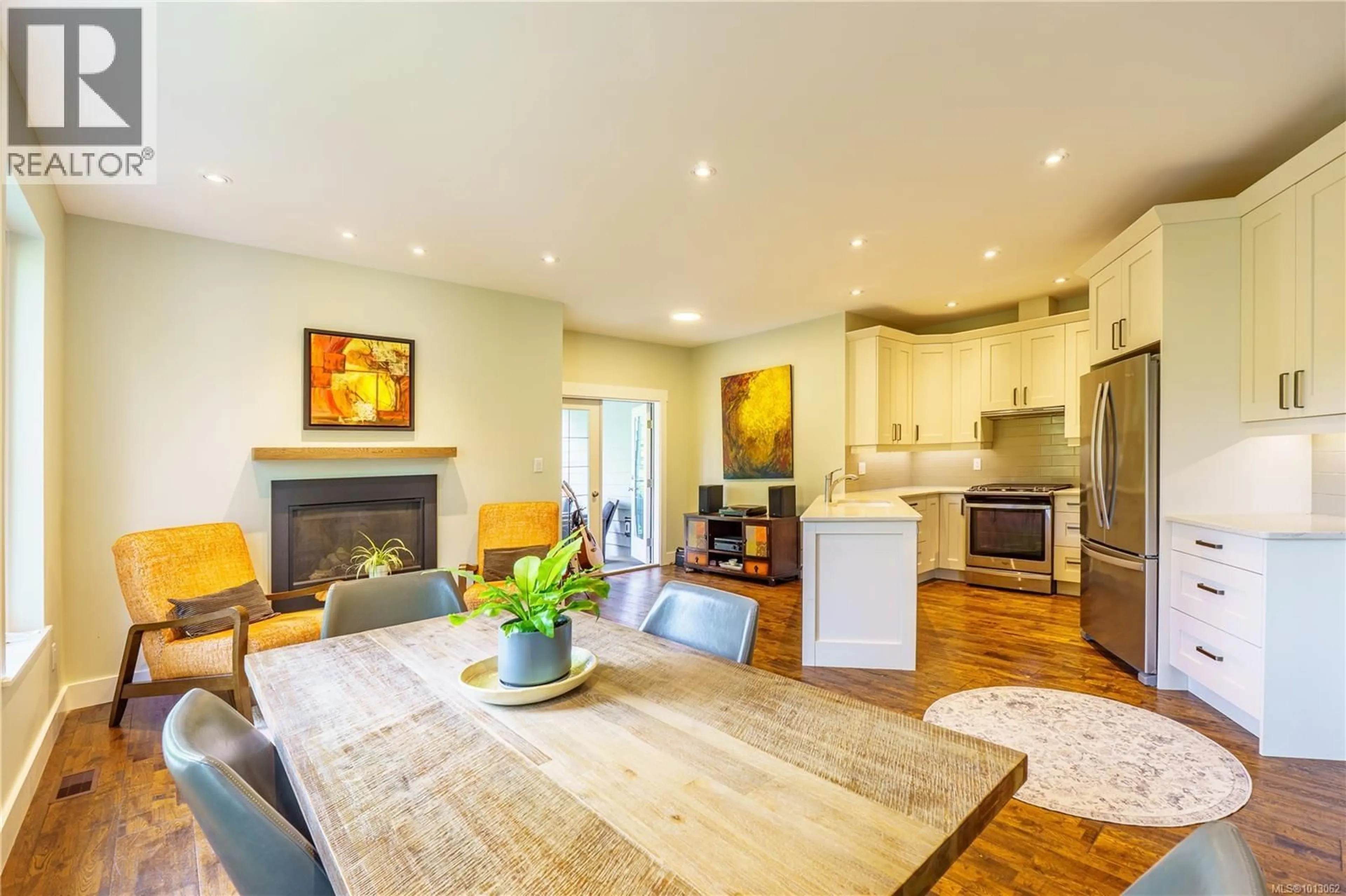 Open concept kitchen, wood/laminate floor for 1840 CEDAR GROVE PLACE, Ucluelet British Columbia V0R3A0