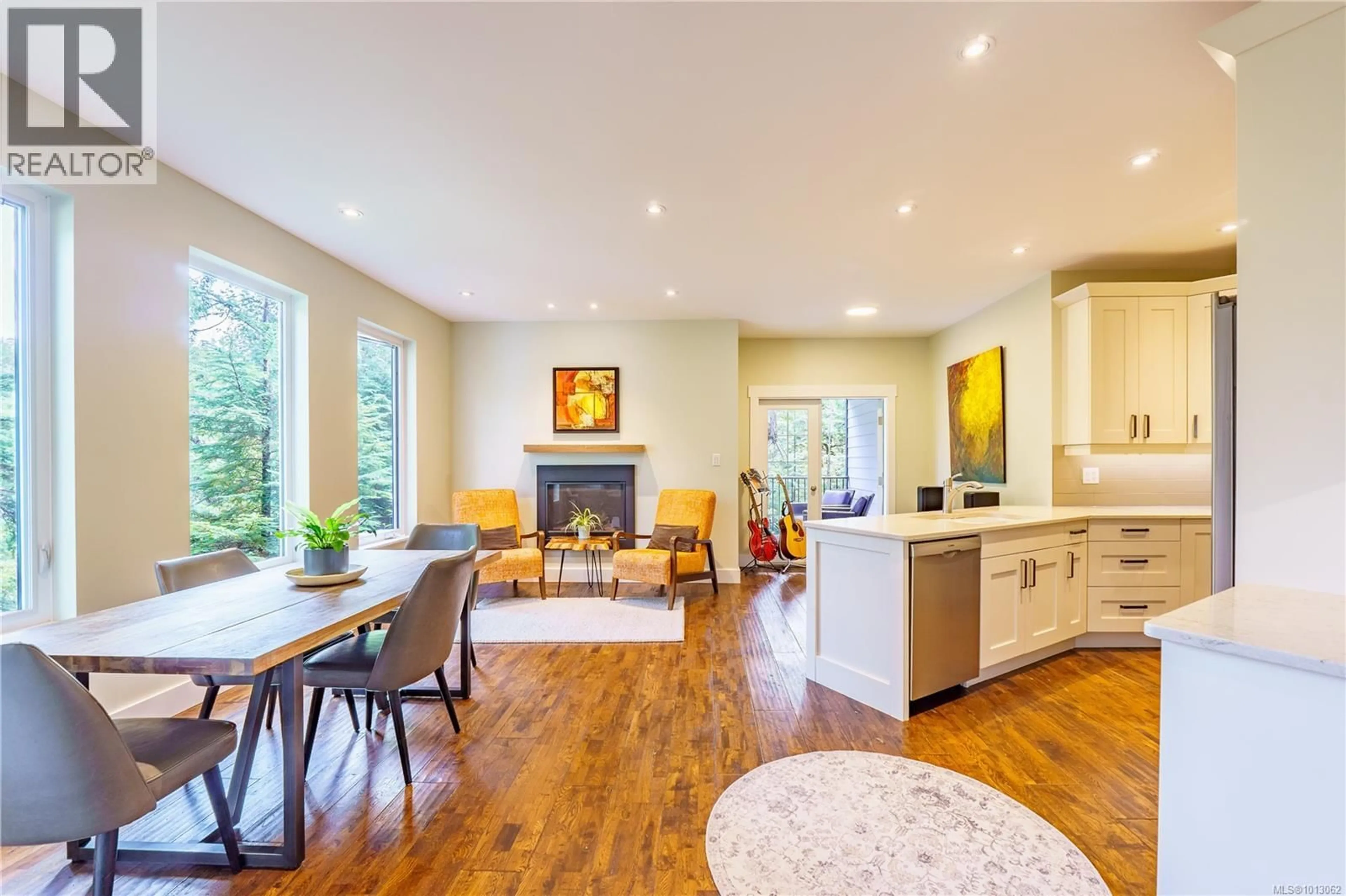 Open concept kitchen, wood/laminate floor for 1840 CEDAR GROVE PLACE, Ucluelet British Columbia V0R3A0