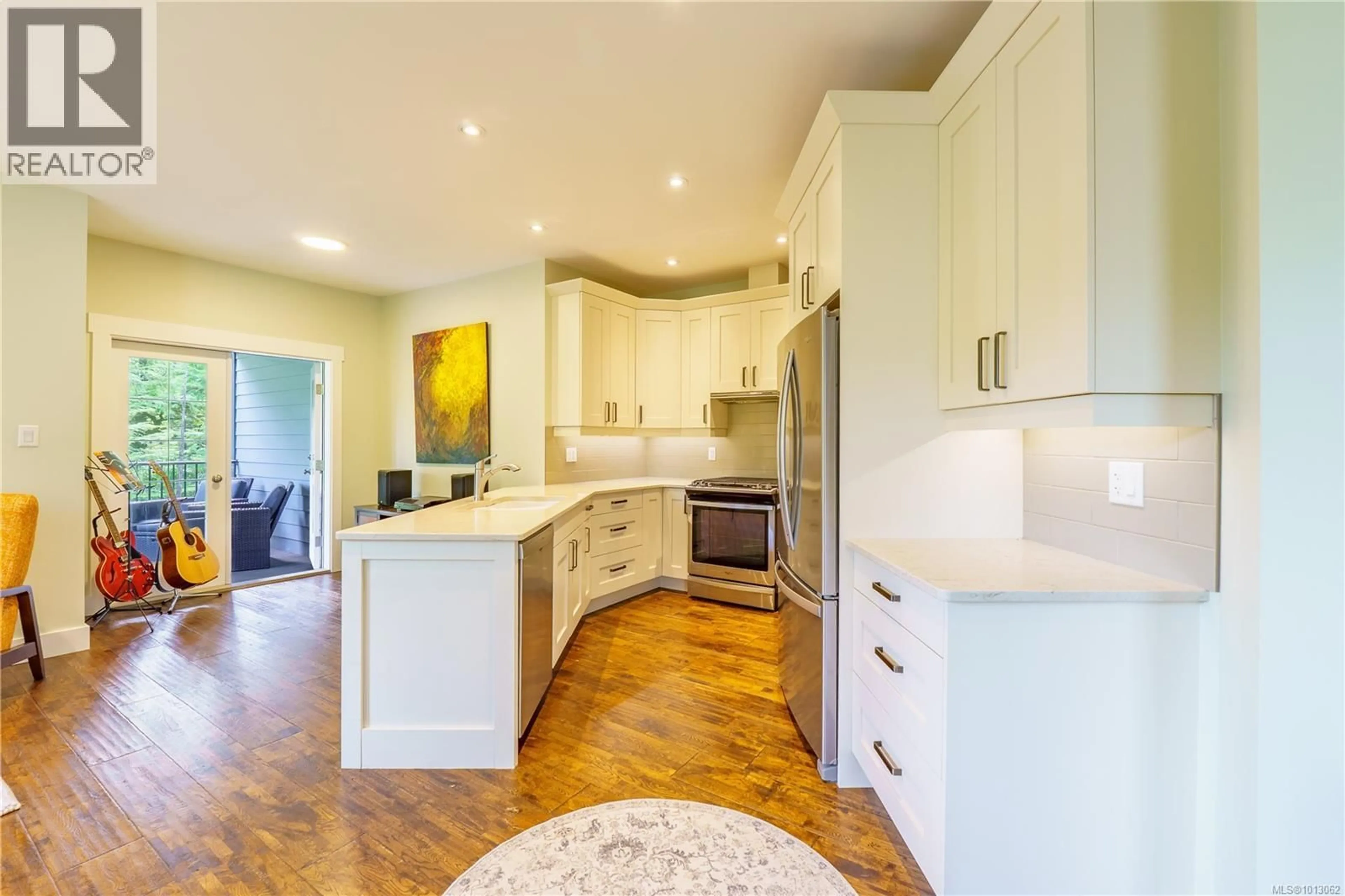 Open concept kitchen, unknown for 1840 CEDAR GROVE PLACE, Ucluelet British Columbia V0R3A0