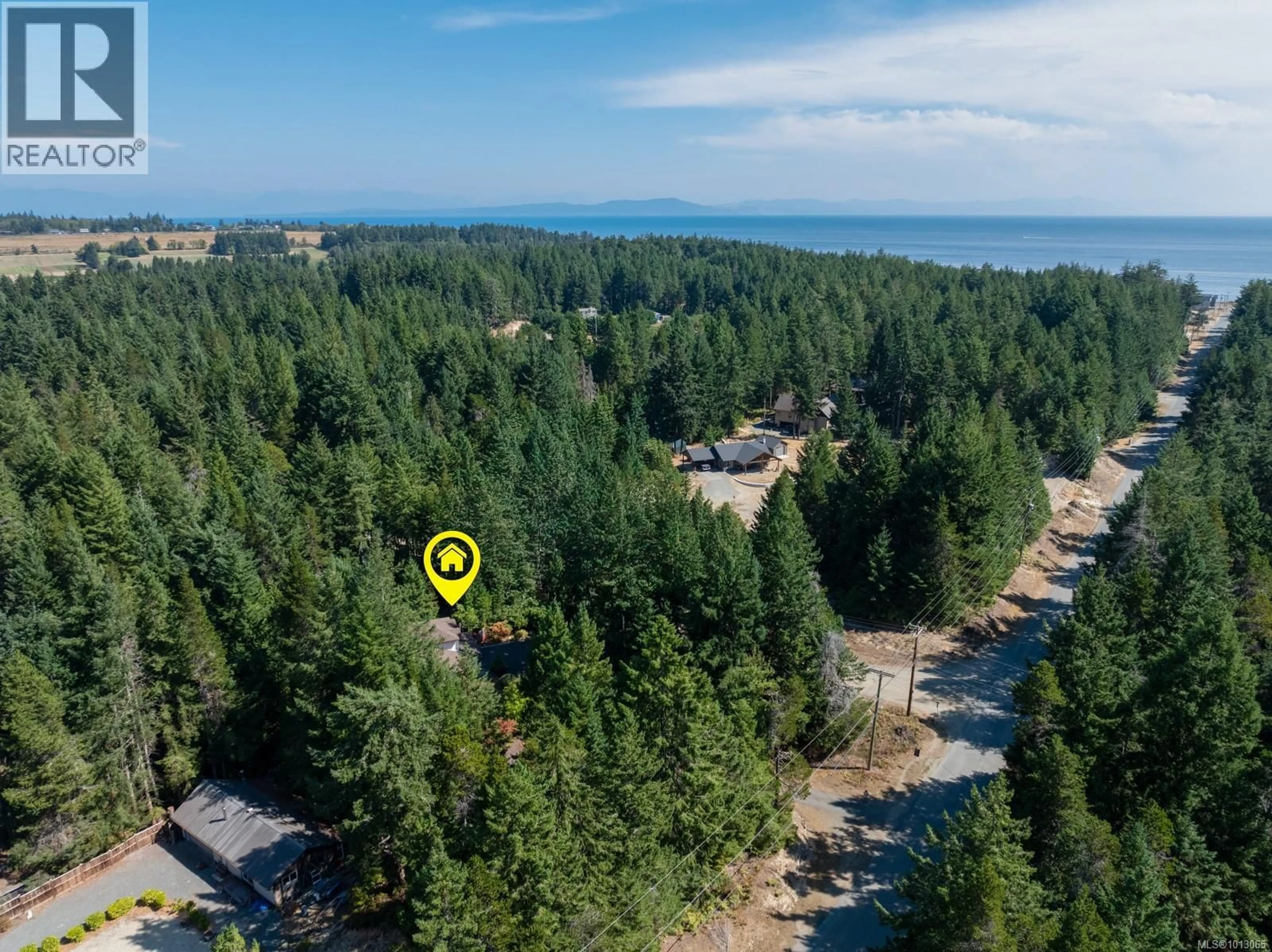 A pic from outside/outdoor area/front of a property/back of a property/a pic from drone, water/lake/river/ocean view for 742 SAND PINES DRIVE, Comox British Columbia V9M3W8