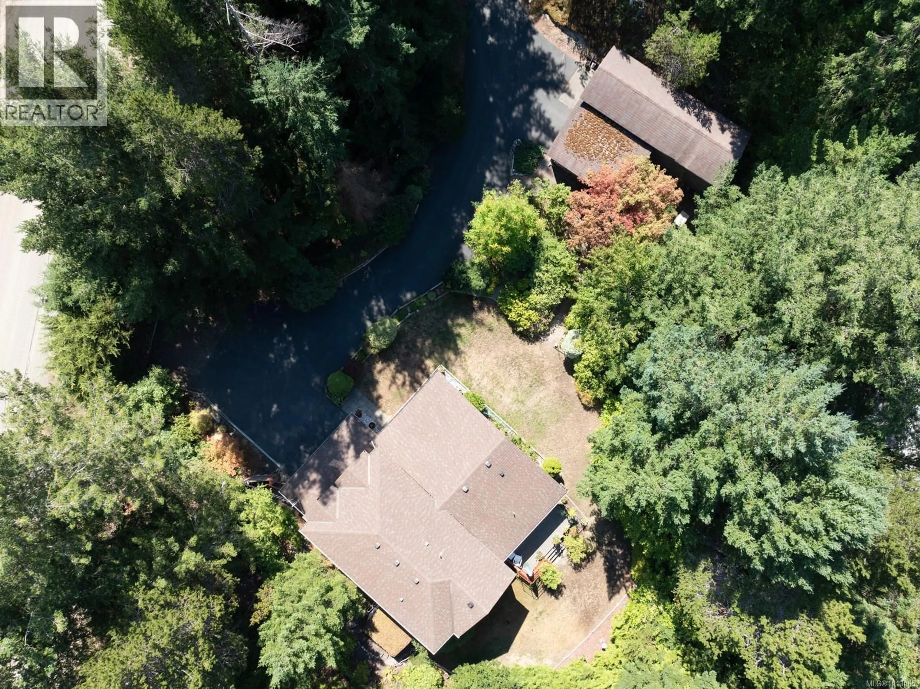 A pic from outside/outdoor area/front of a property/back of a property/a pic from drone, forest/trees view for 742 SAND PINES DRIVE, Comox British Columbia V9M3W8