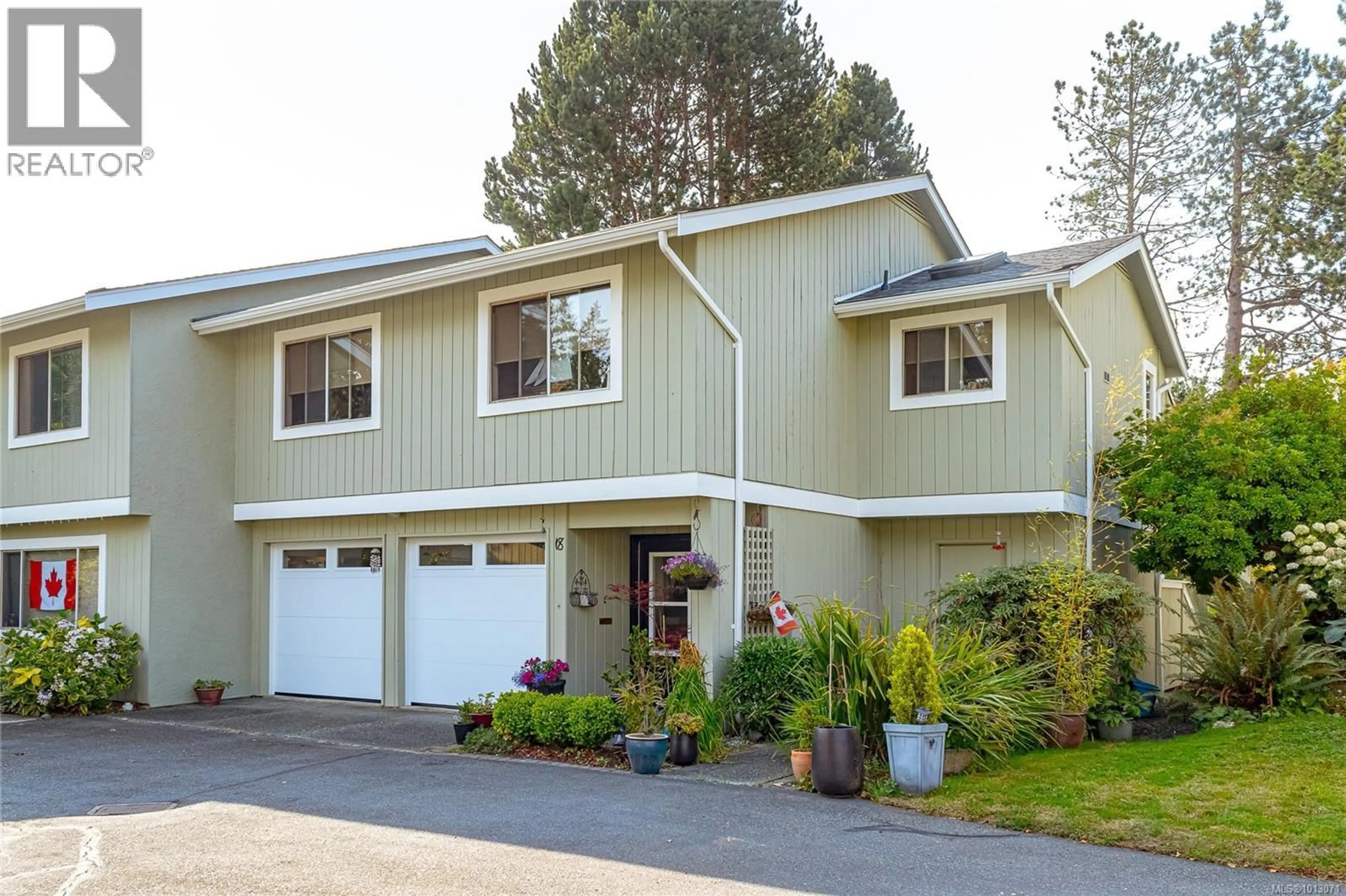 Home with vinyl exterior material, street for 18 - 2020 WHITE BIRCH ROAD, Sidney British Columbia V8R2R1