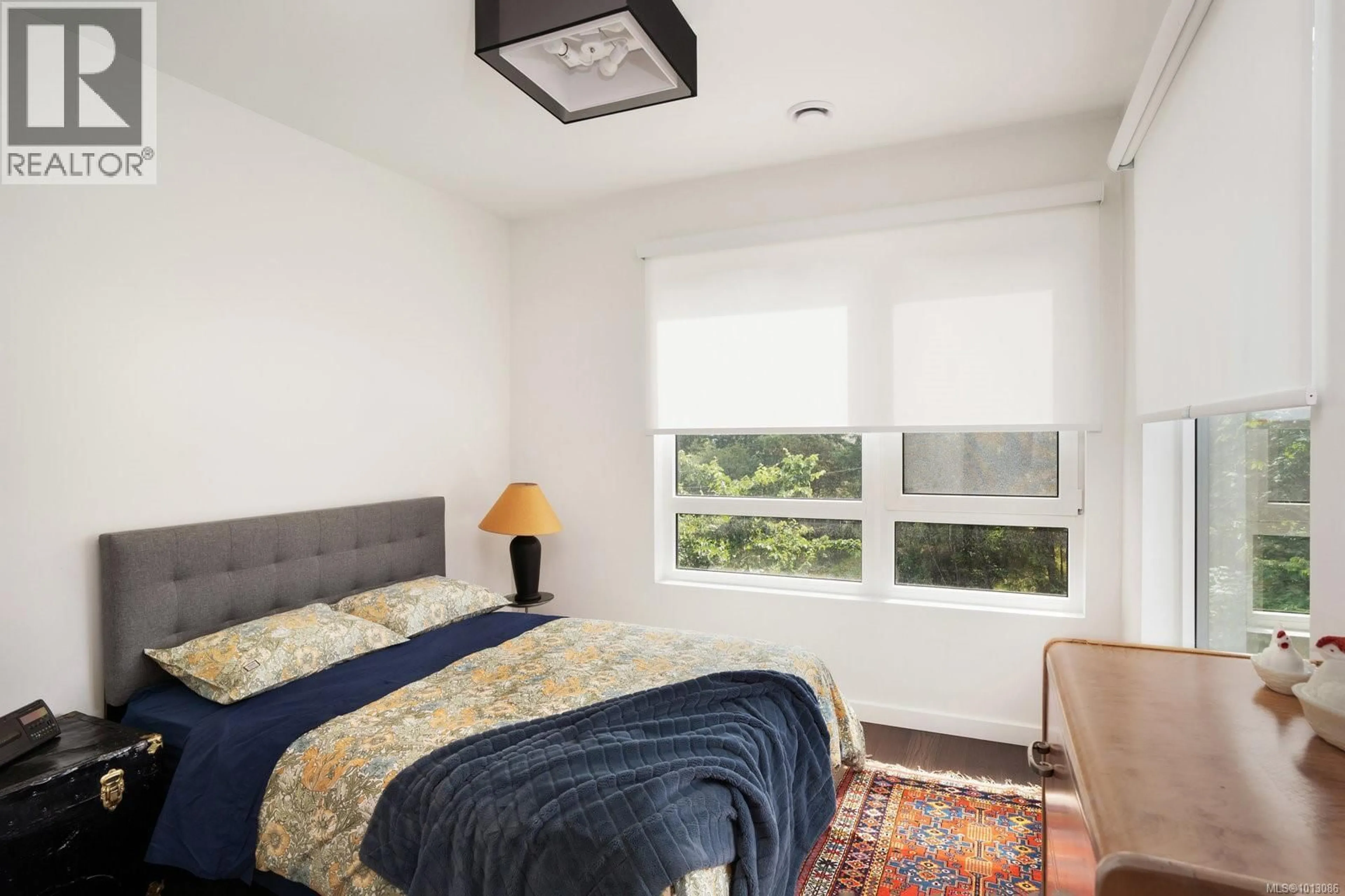 Bedroom with bed, carpet floor for 3508 WISHART ROAD, Colwood British Columbia V9C3B1