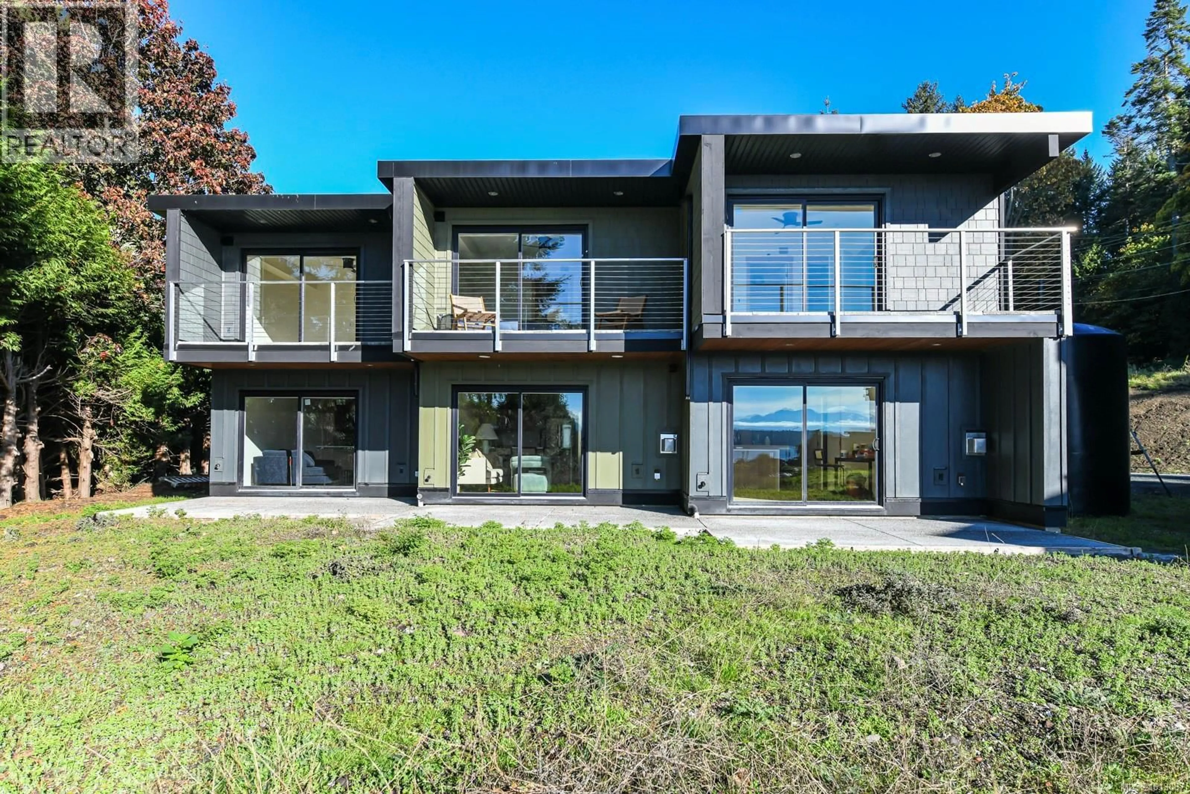 Home with brick exterior material, unknown for 213 - 4305 SHINGLE SPIT ROAD, Hornby Island British Columbia V0R1Z0