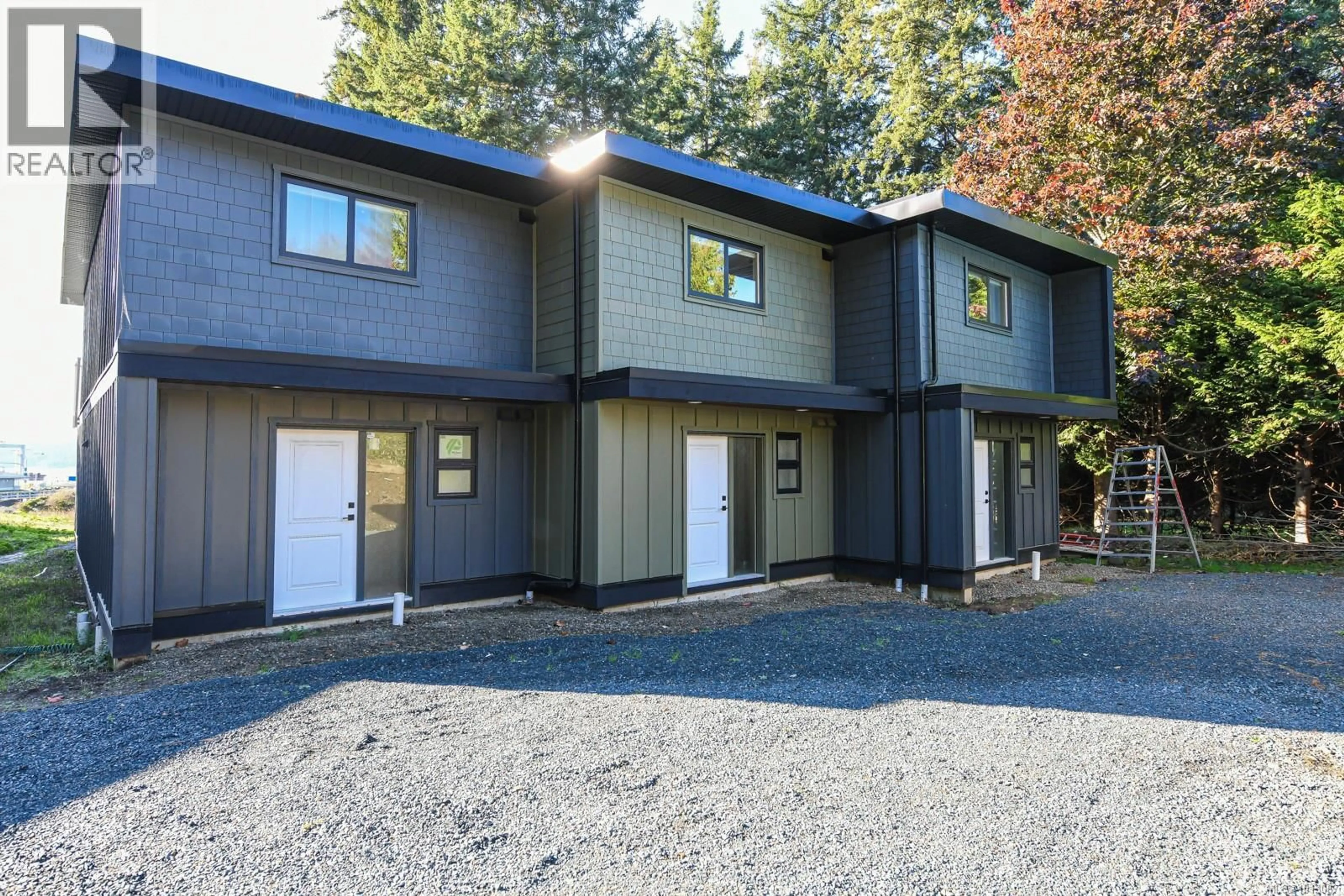 Home with vinyl exterior material, street for 213 - 4305 SHINGLE SPIT ROAD, Hornby Island British Columbia V0R1Z0