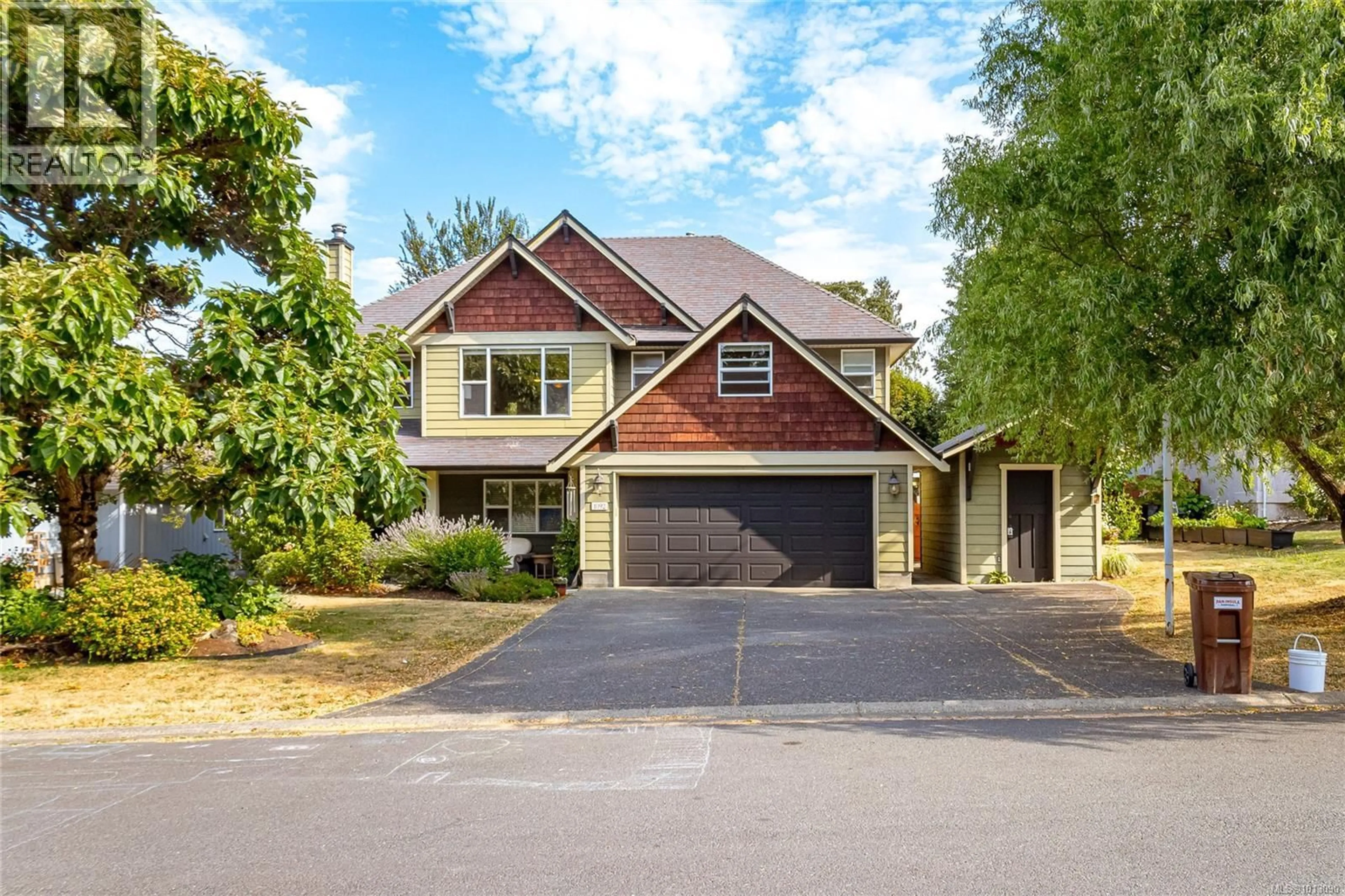 Home with brick exterior material, street for 1092 LUCILLE DRIVE, Central Saanich British Columbia V8M1C8