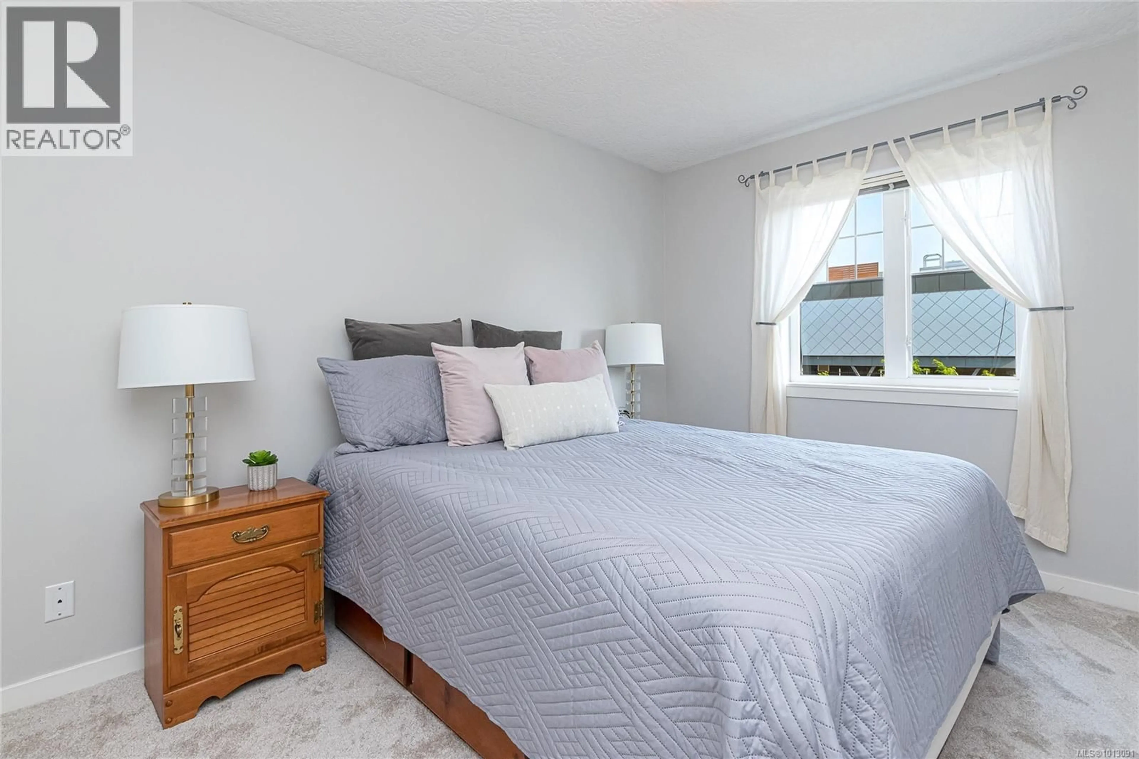 Bedroom with bed, unknown for 203 - 2844 BRYN MAUR ROAD, Langford British Columbia L1L1L1