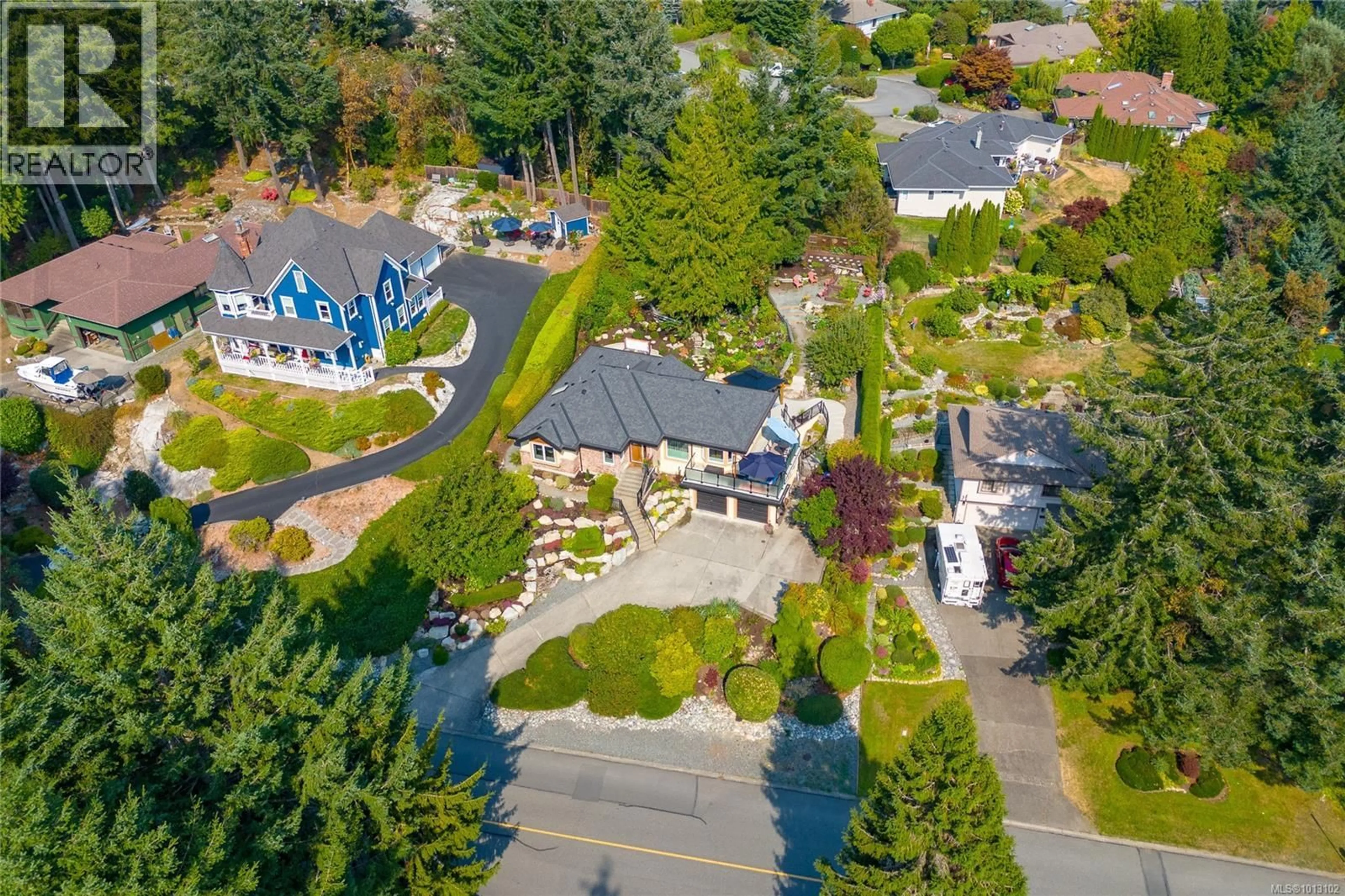 A pic from outside/outdoor area/front of a property/back of a property/a pic from drone, street for 1650 BARRETT DRIVE, North Saanich British Columbia V8L5A6