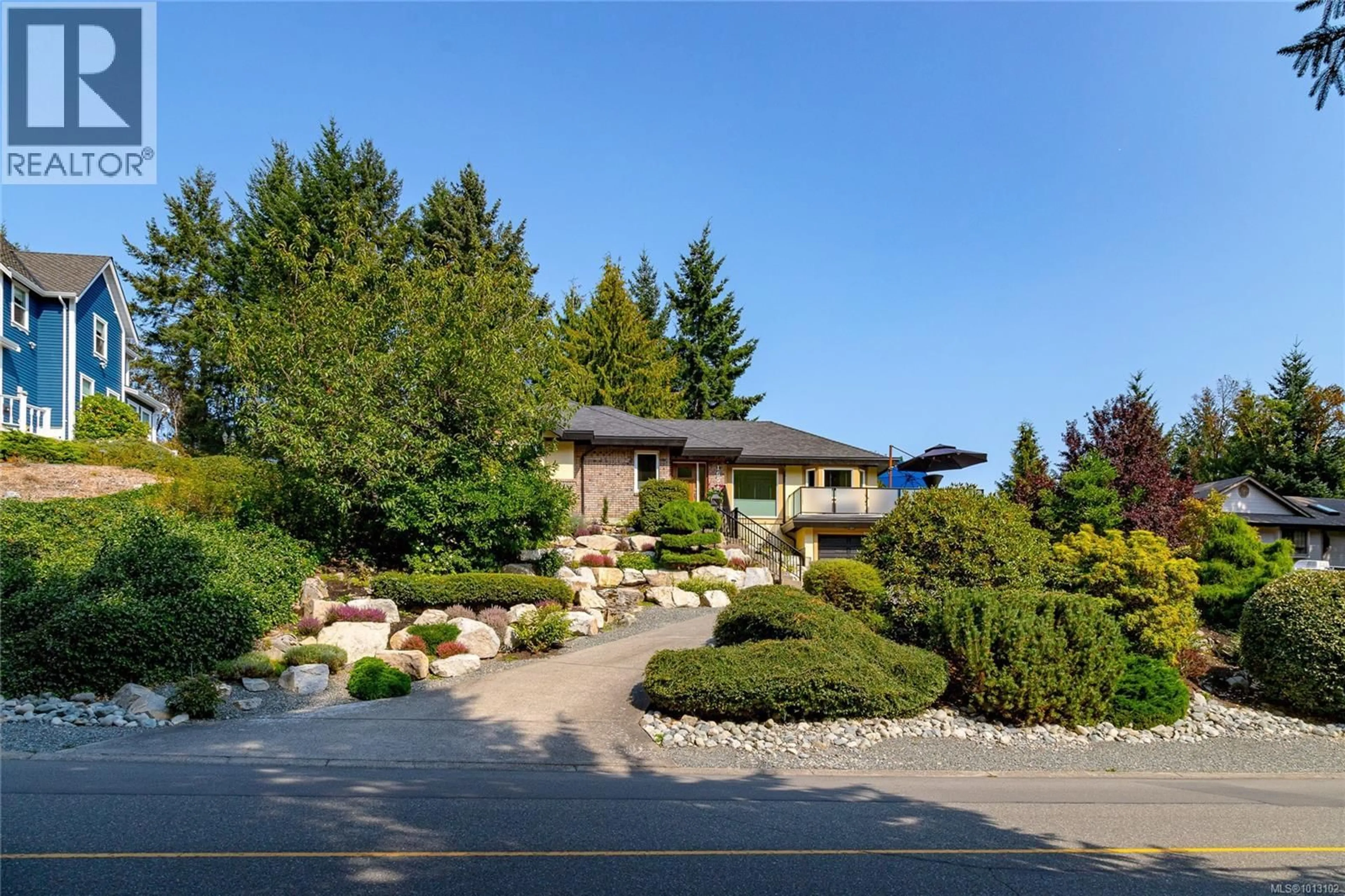 A pic from outside/outdoor area/front of a property/back of a property/a pic from drone, street for 1650 BARRETT DRIVE, North Saanich British Columbia V8L5A6