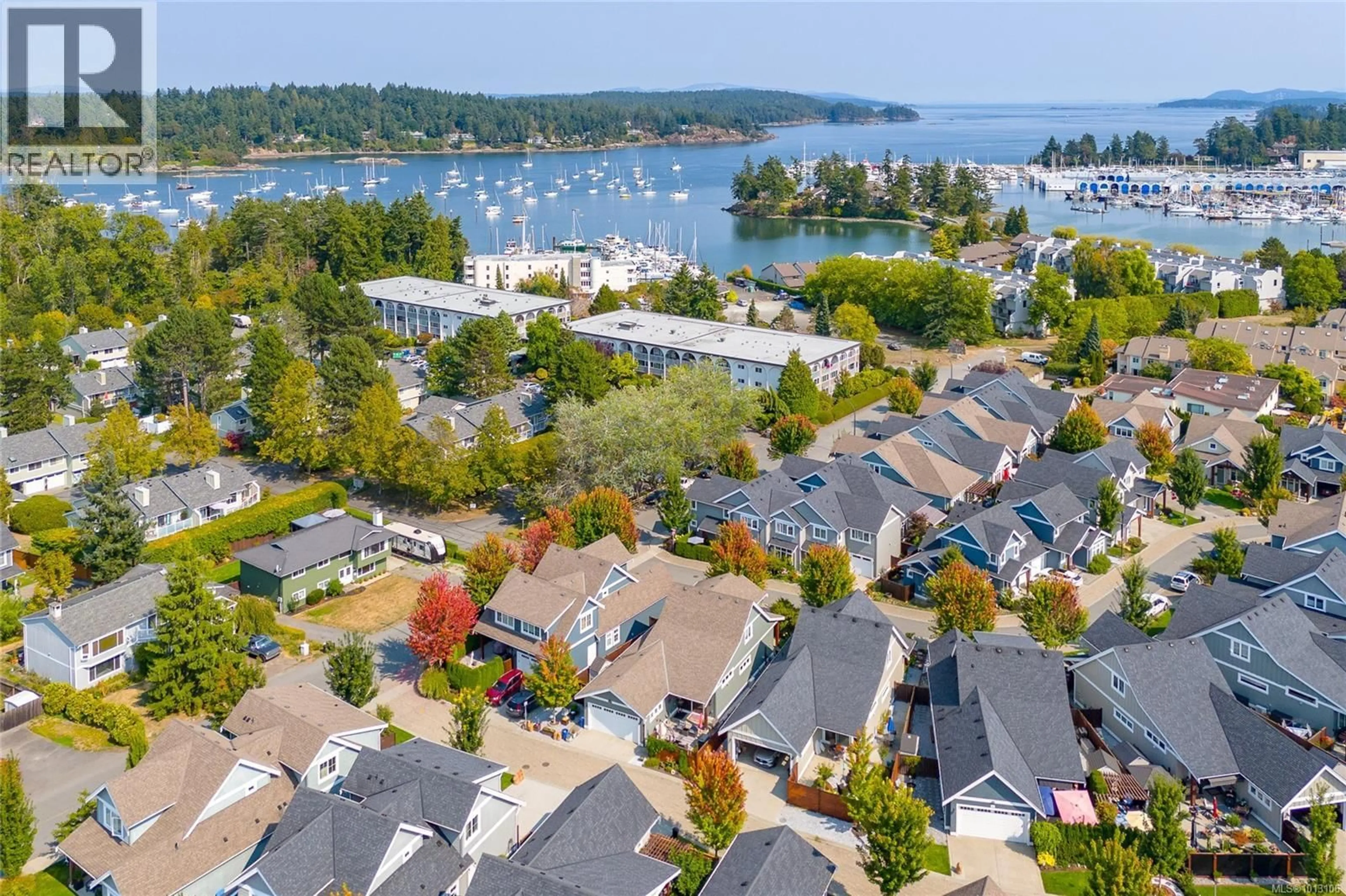 A pic from outside/outdoor area/front of a property/back of a property/a pic from drone, water/lake/river/ocean view for 2019 SEAWIND WAY, Sidney British Columbia V8L0C4
