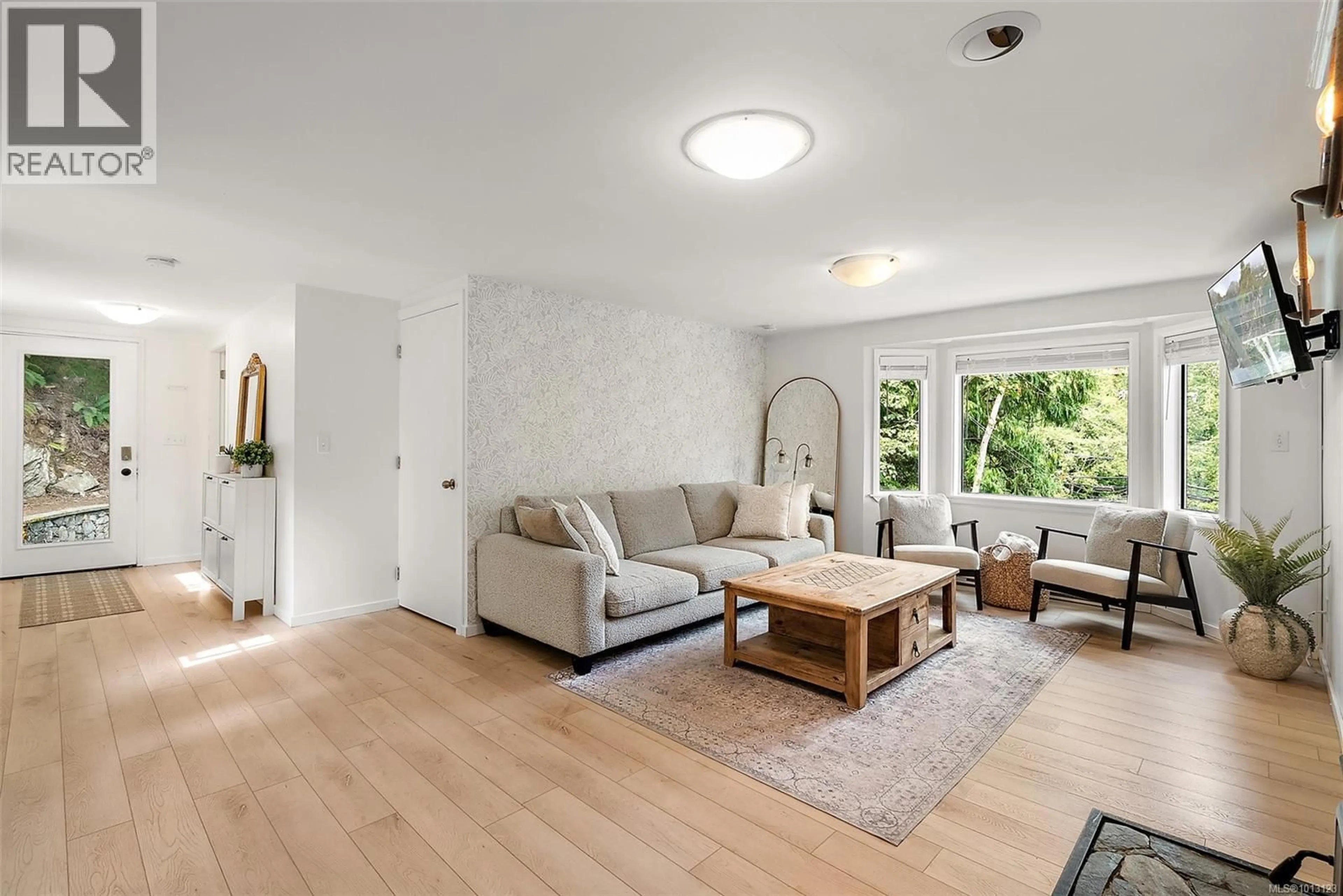 Living room with furniture, wood/laminate floor for 729 LATORIA ROAD, Langford British Columbia V9C4J1