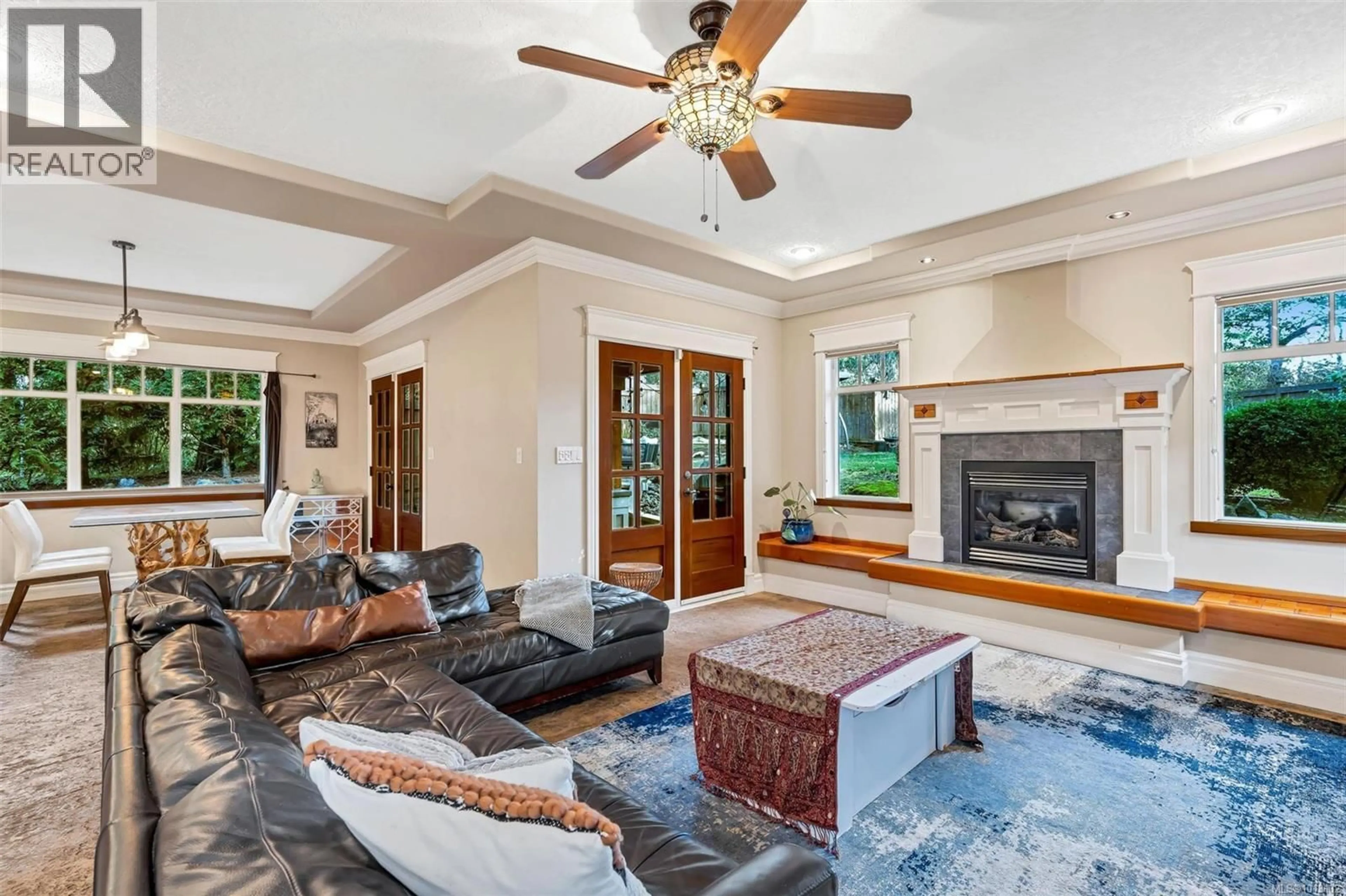 Living room with furniture, ceramic/tile floor for 411 CONWAY ROAD, Saanich British Columbia V9E2B9