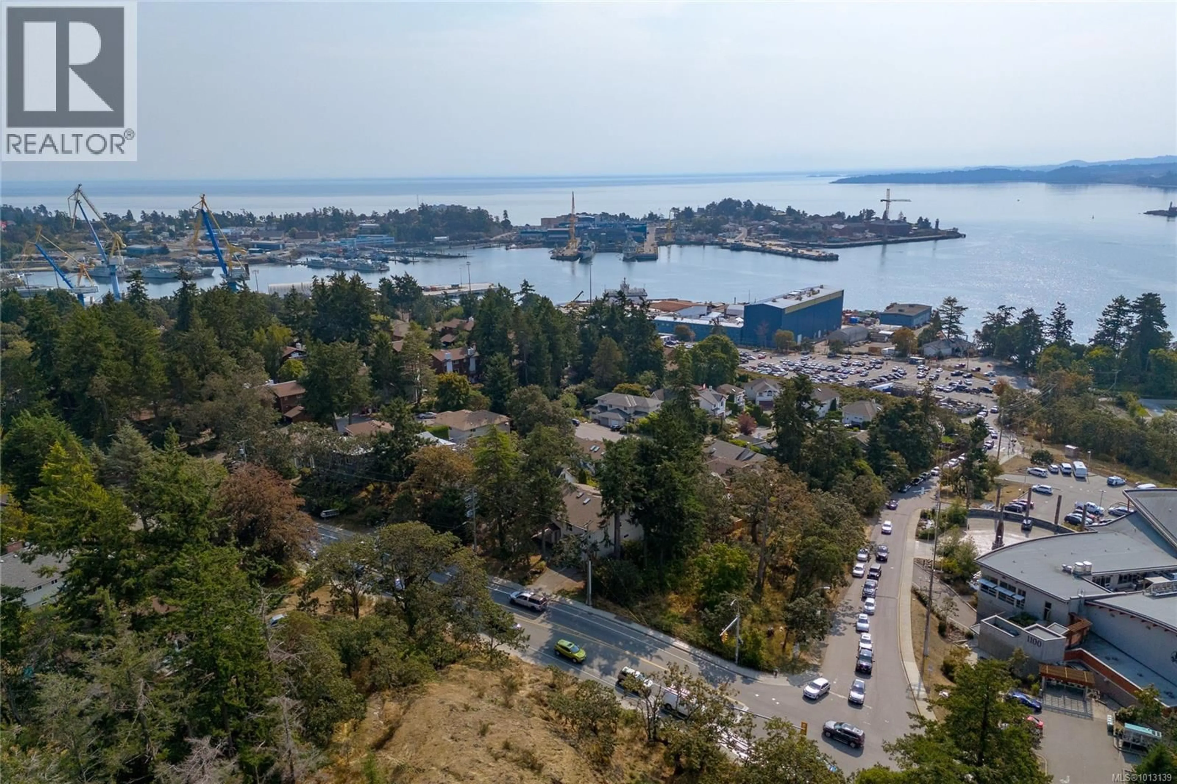 A pic from outside/outdoor area/front of a property/back of a property/a pic from drone, water/lake/river/ocean view for 999 ADMIRALS ROAD, Esquimalt British Columbia V9A2P1