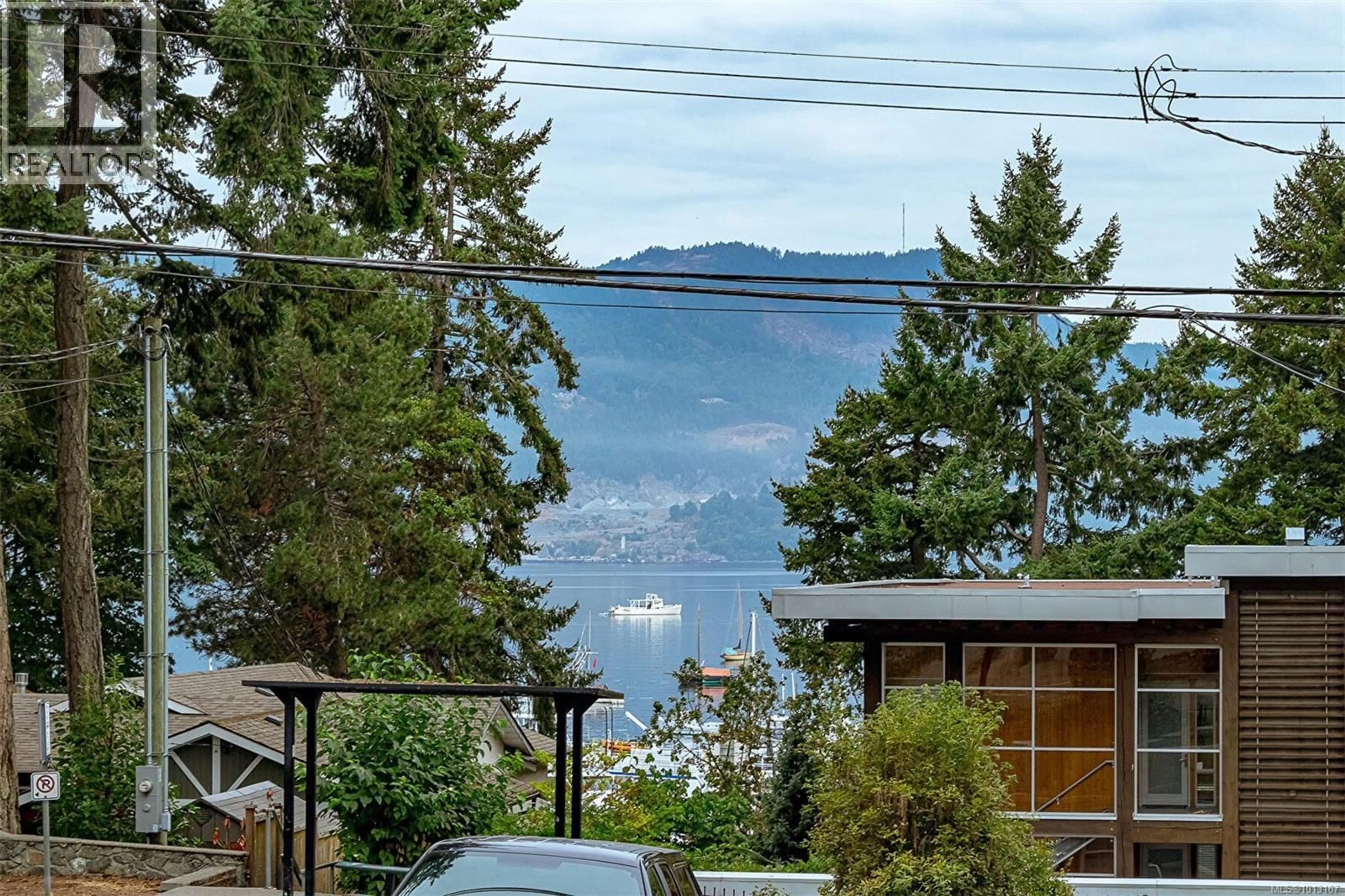 A pic from outside/outdoor area/front of a property/back of a property/a pic from drone, water/lake/river/ocean view for 7155 BRENTWOOD DRIVE, Central Saanich British Columbia V8M1B7