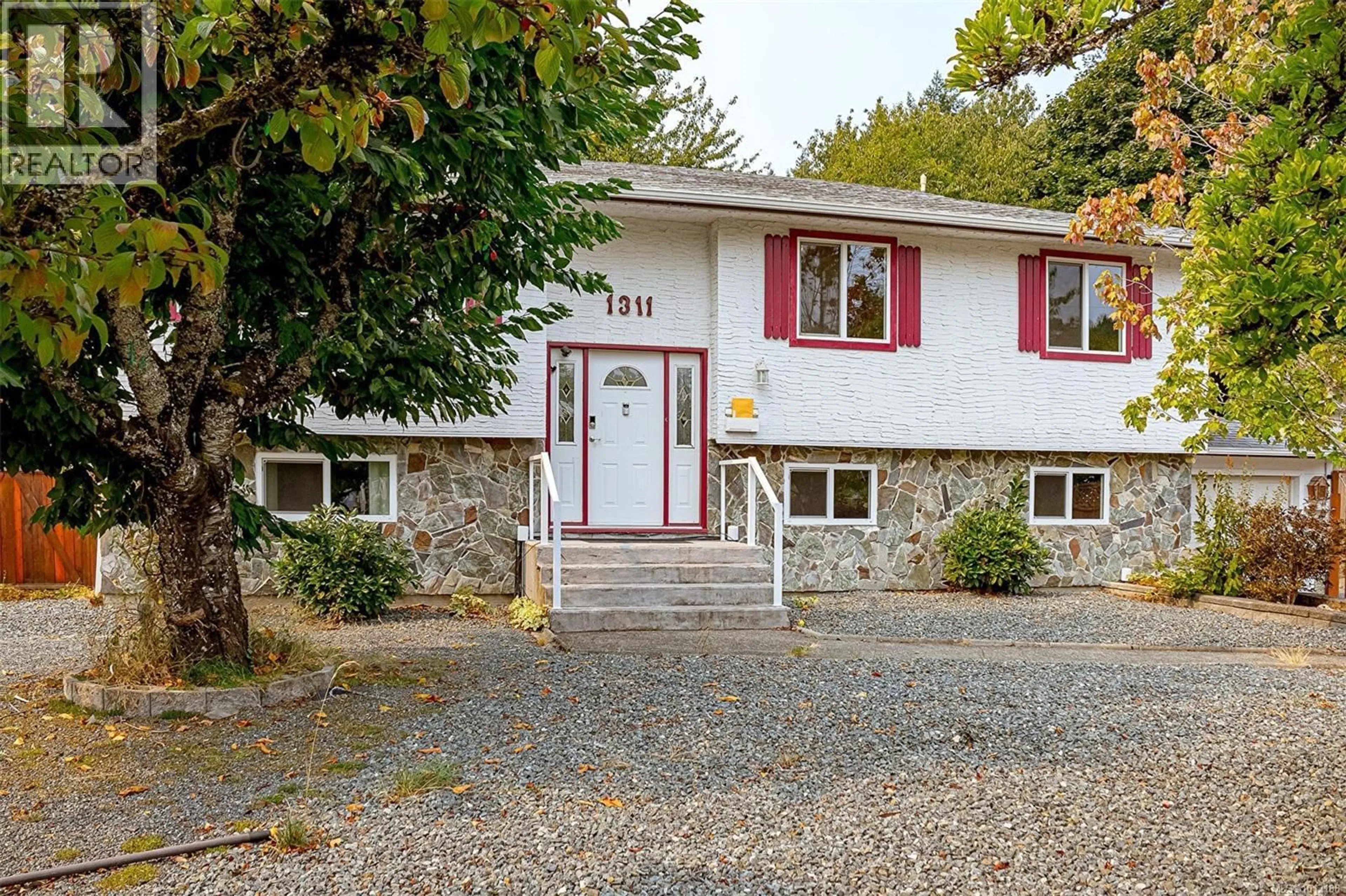 Home with vinyl exterior material, street for 1311 DANGAR PLACE, Langford British Columbia V9B4J7