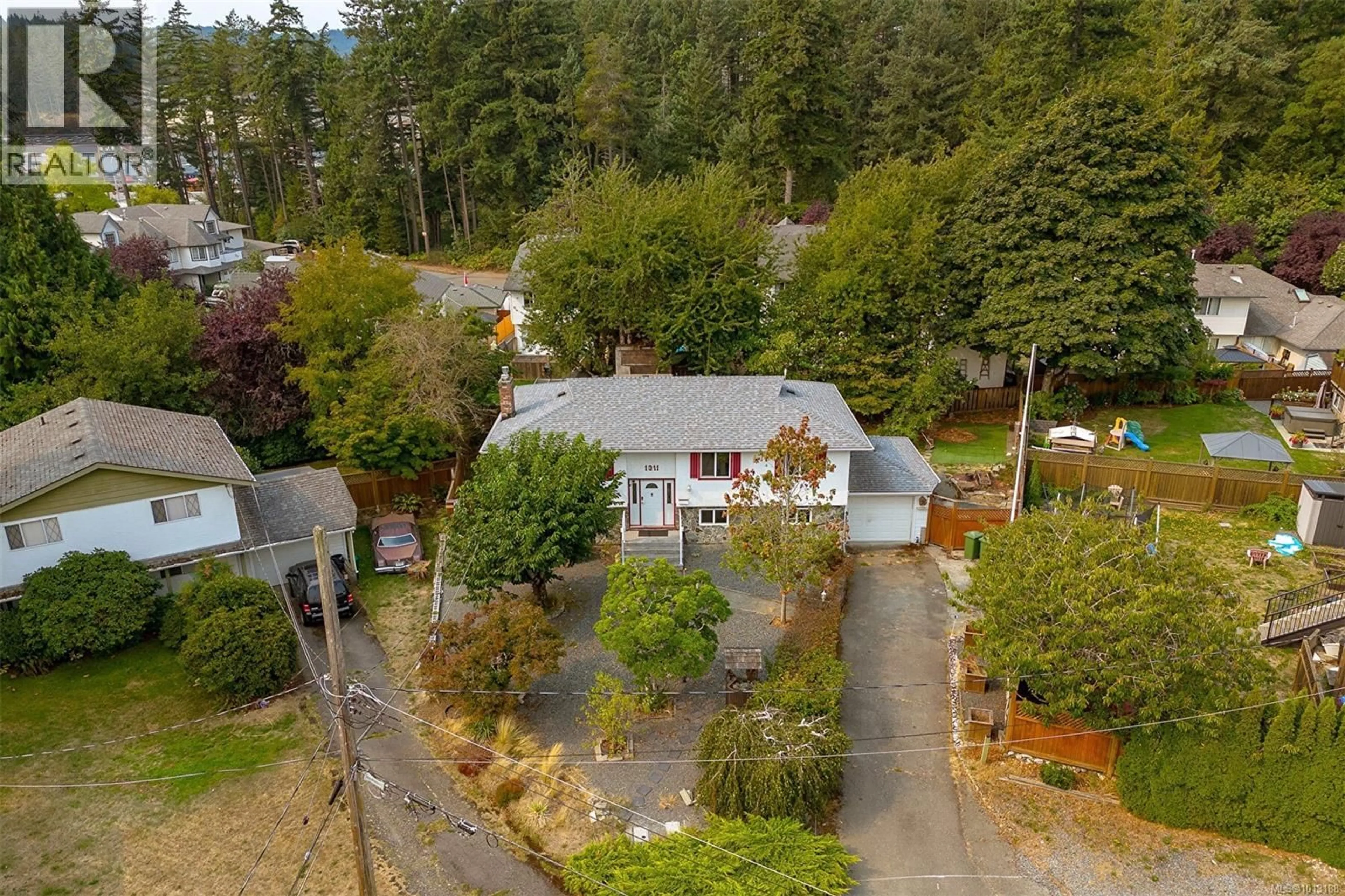 A pic from outside/outdoor area/front of a property/back of a property/a pic from drone, street for 1311 DANGAR PLACE, Langford British Columbia V9B4J7