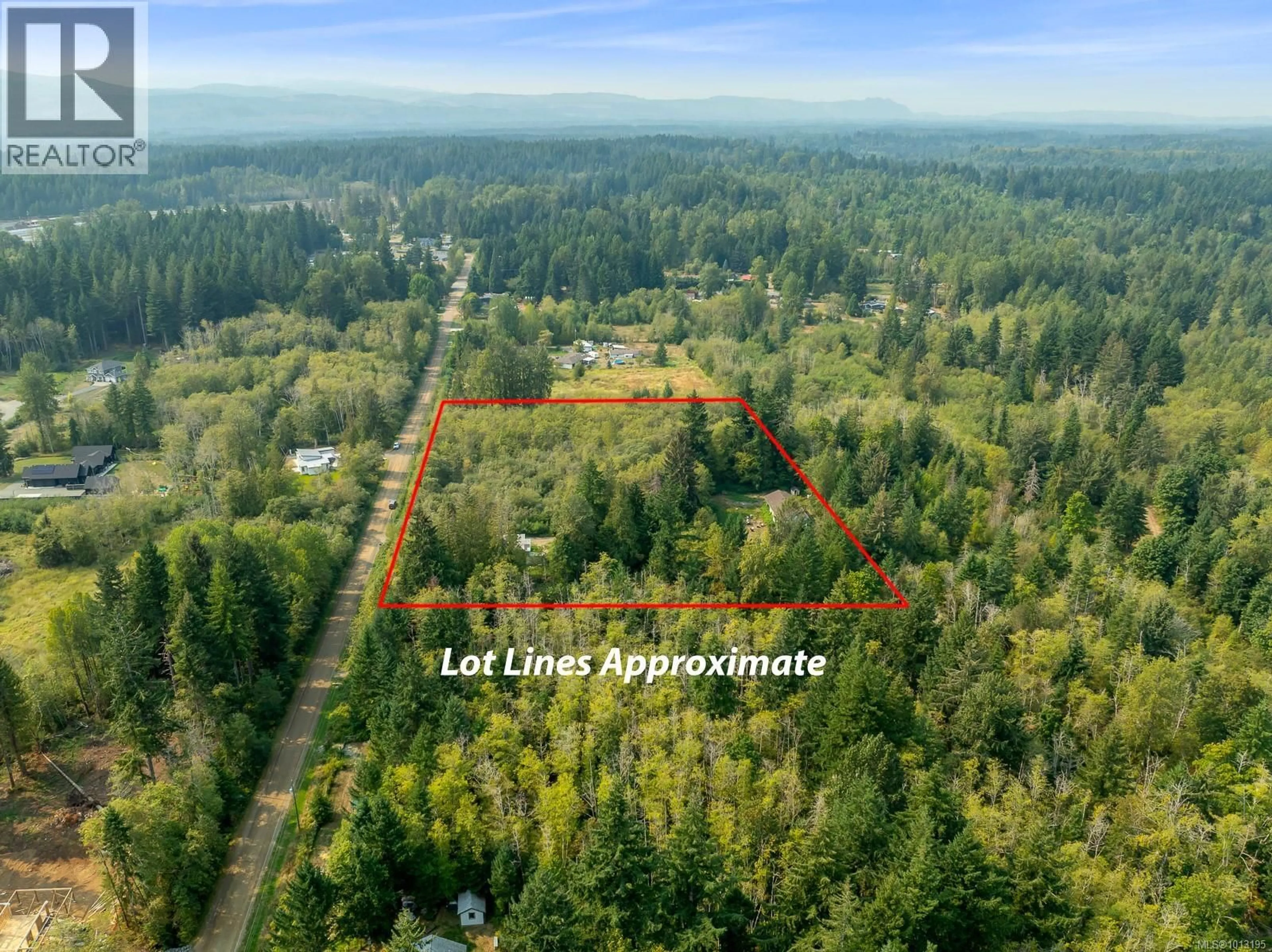 A pic from outside/outdoor area/front of a property/back of a property/a pic from drone, forest/trees view for 2180 SCHULZ ROAD, Black Creek British Columbia V9J1K5