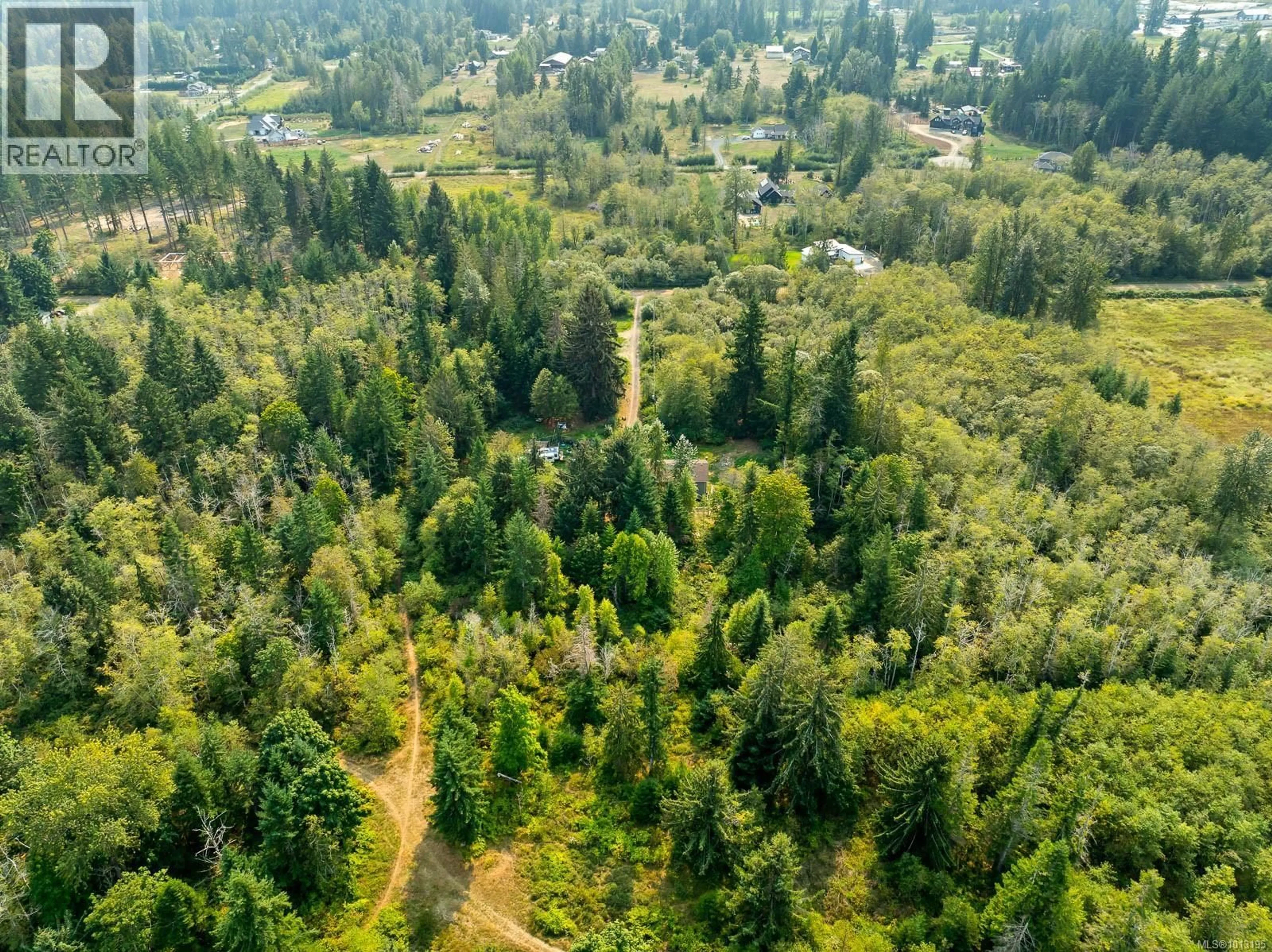 A pic from outside/outdoor area/front of a property/back of a property/a pic from drone, forest/trees view for 2180 SCHULZ ROAD, Black Creek British Columbia V9J1K5