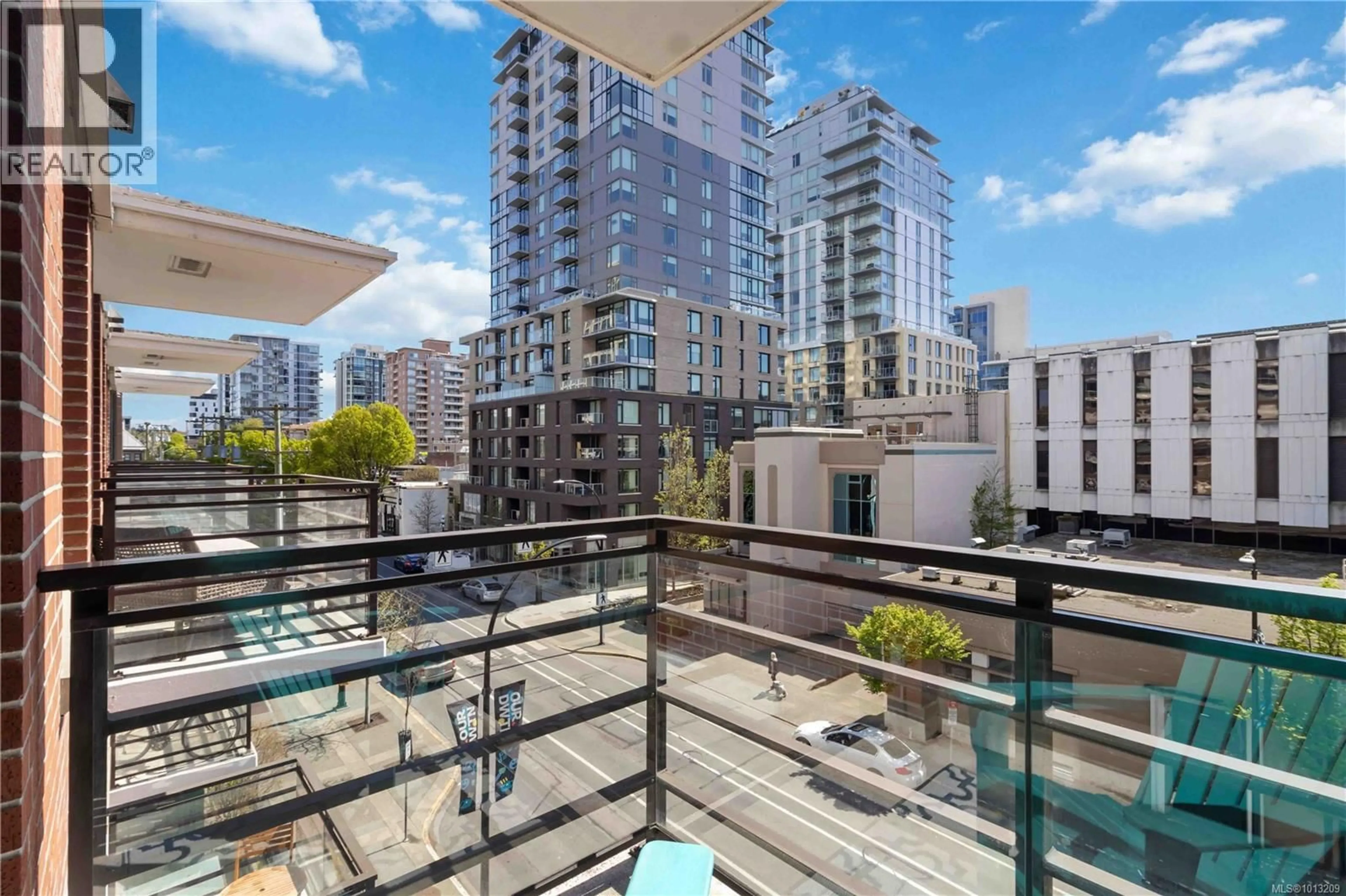Balcony in the apartment, city buildings view from balcony for 406 - 834 JOHNSON STREET, Victoria British Columbia V8W1N3