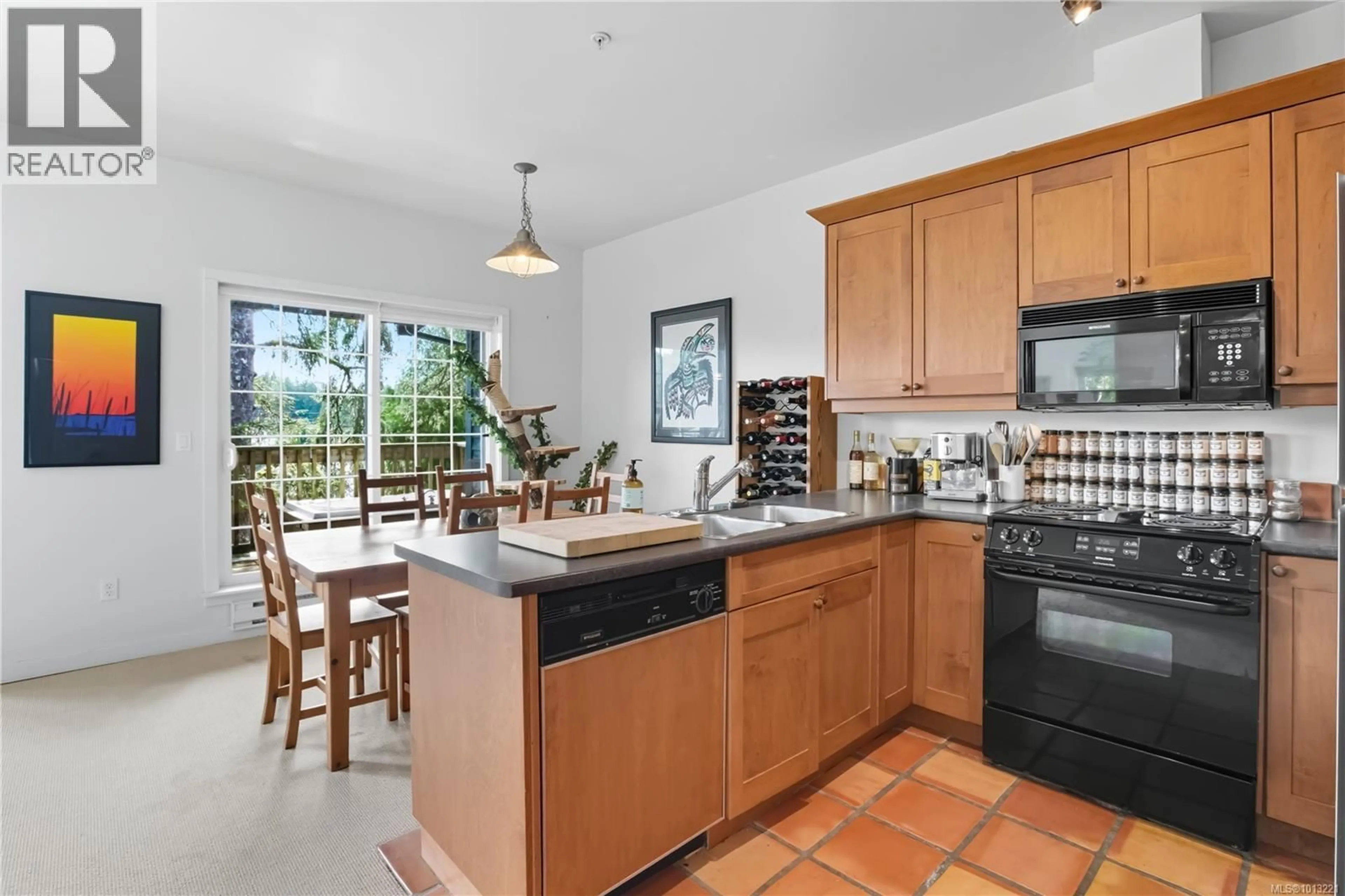 Open concept kitchen, ceramic/tile floor for 1003 - 1971 HARBOUR CRESCENT, Ucluelet British Columbia V0R3A0