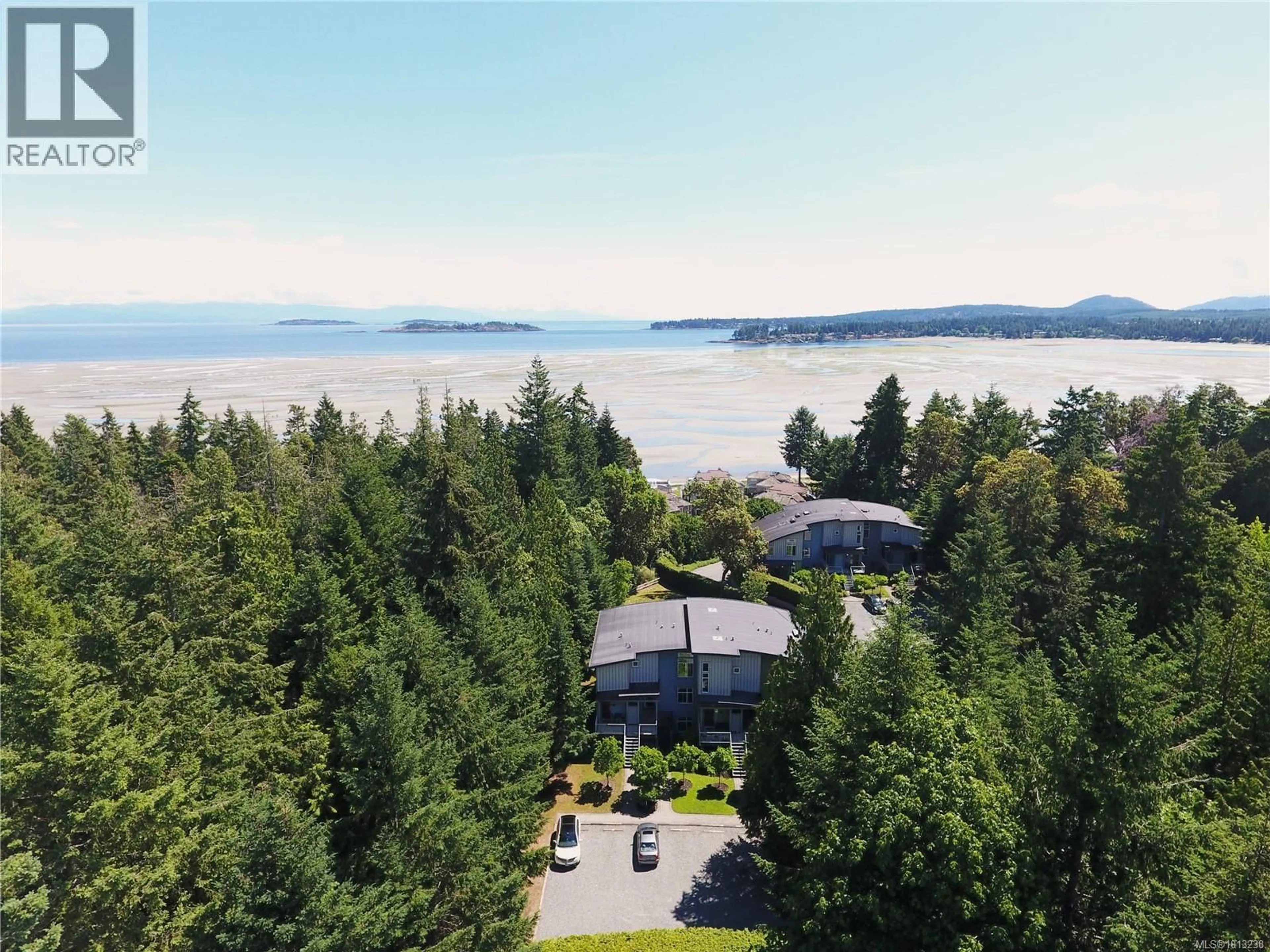 A pic from outside/outdoor area/front of a property/back of a property/a pic from drone, water/lake/river/ocean view for 32 - 1059 TANGLEWOOD PLACE, Parksville British Columbia V9P2E2