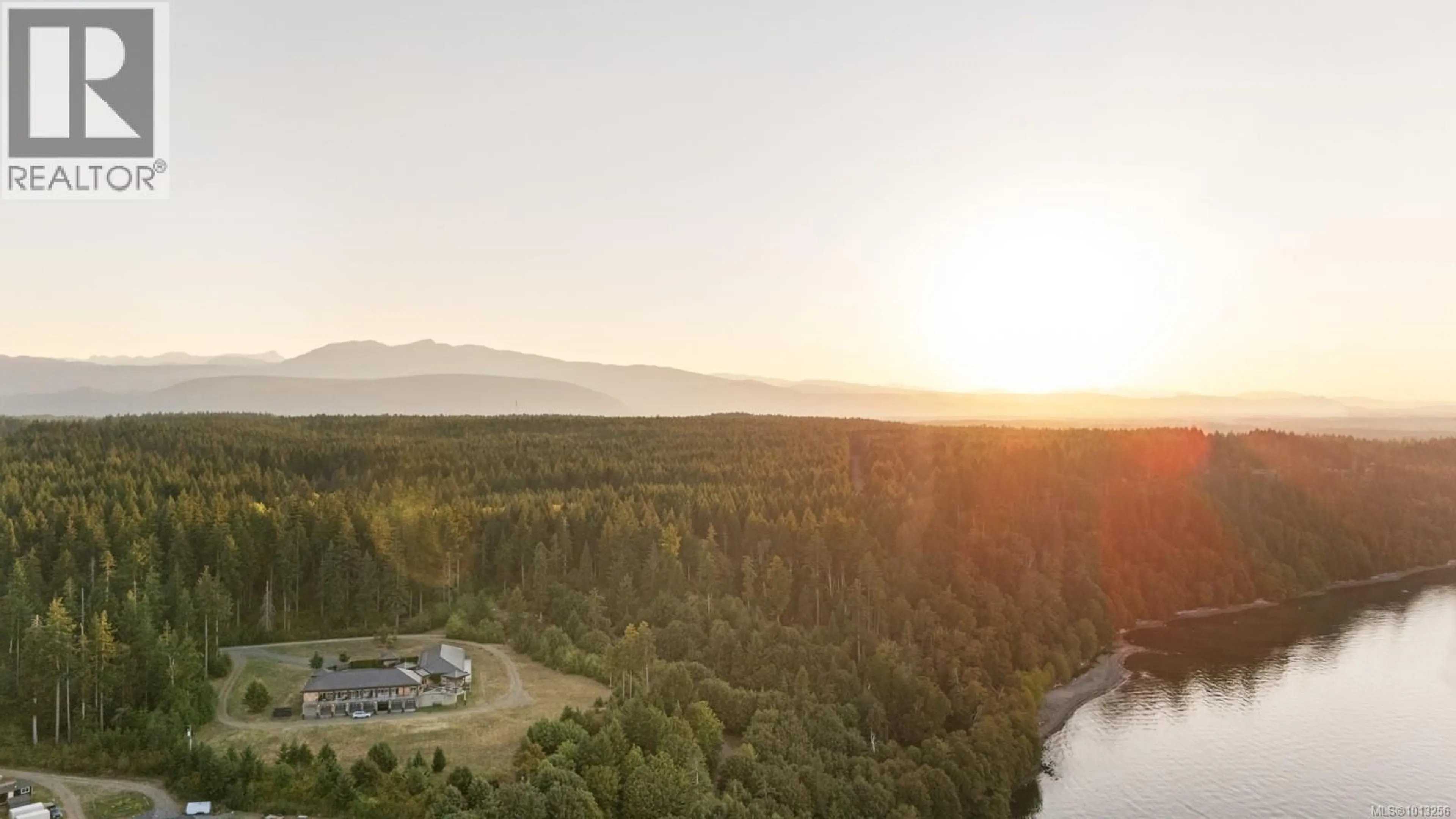 A pic from outside/outdoor area/front of a property/back of a property/a pic from drone, mountain view for 7939 LENWOOD ROAD, Merville British Columbia V0R2M0