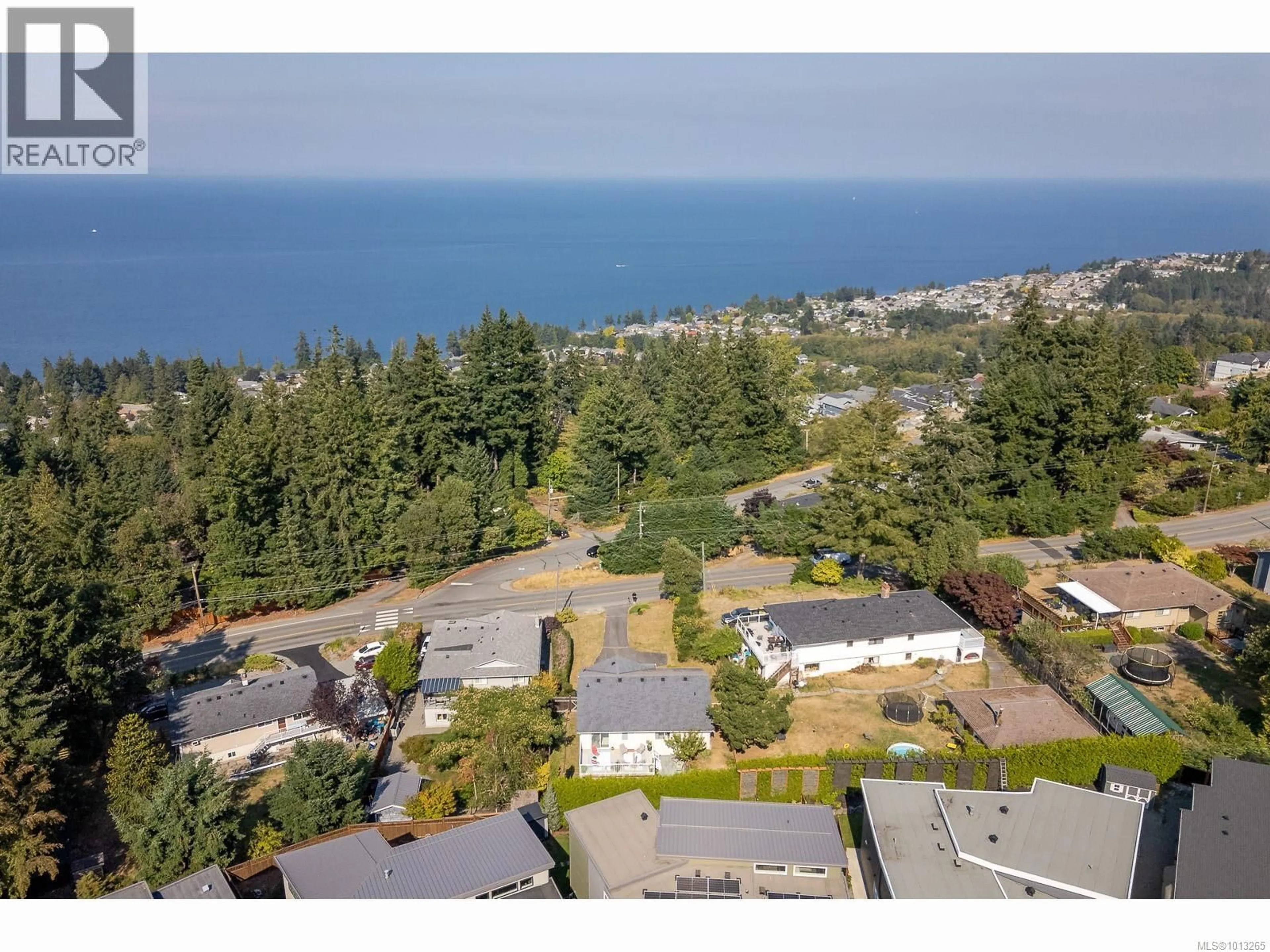 A pic from outside/outdoor area/front of a property/back of a property/a pic from drone, water/lake/river/ocean view for 5399 LOST LAKE ROAD, Nanaimo British Columbia V9T5E7