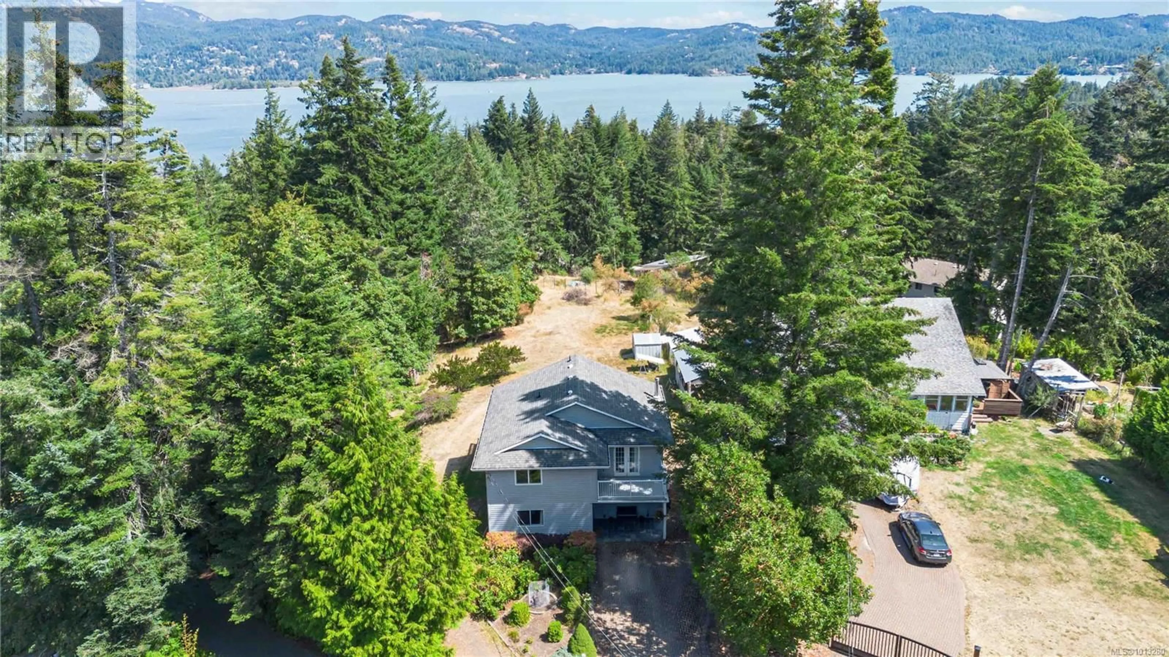 A pic from outside/outdoor area/front of a property/back of a property/a pic from drone, water/lake/river/ocean view for 1385 CLUN PLACE, Sooke British Columbia V9Z1B1