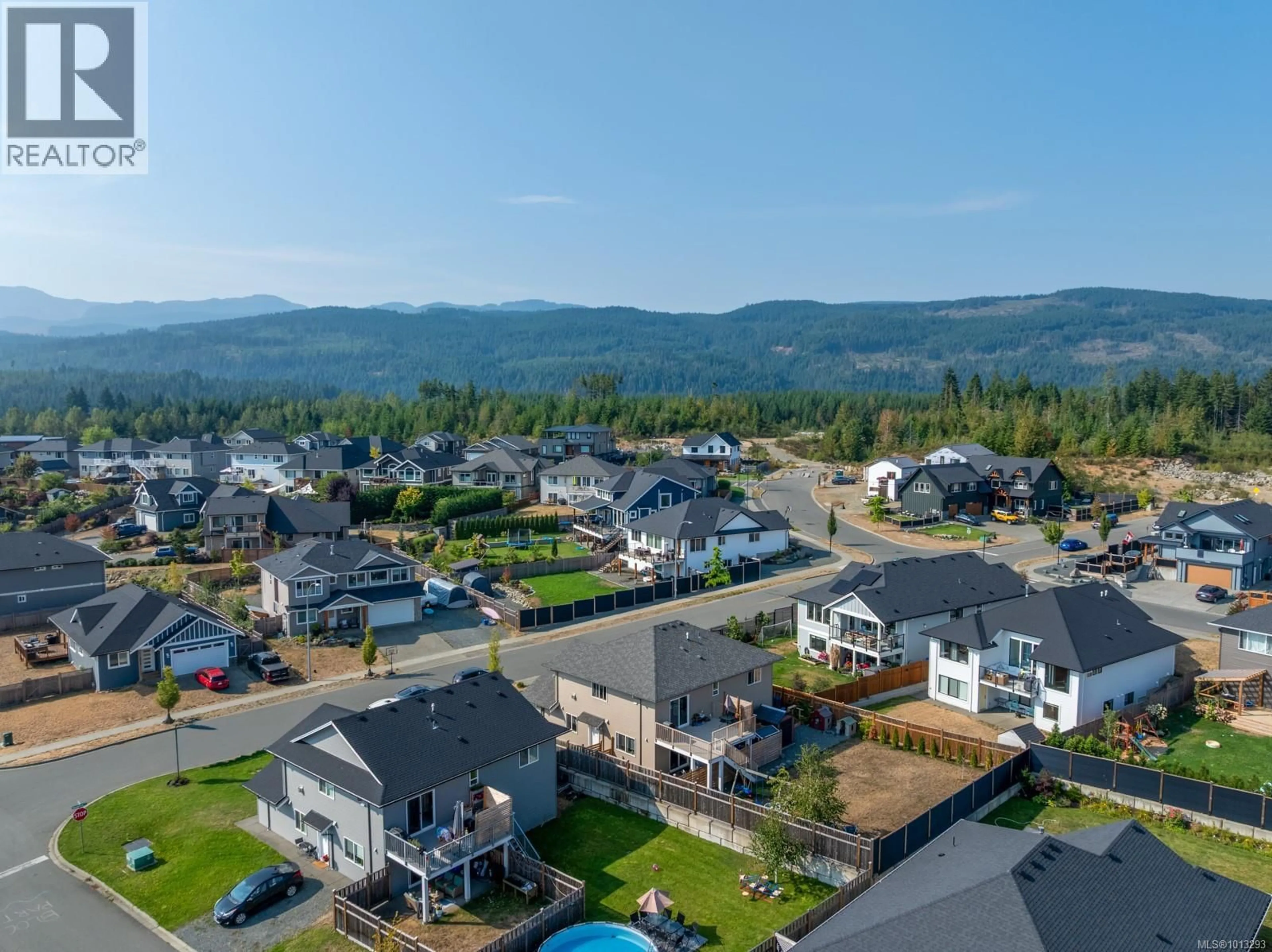 A pic from outside/outdoor area/front of a property/back of a property/a pic from drone, mountain view for 2514 BEAUMONT AVENUE, Cumberland British Columbia V0R1S0