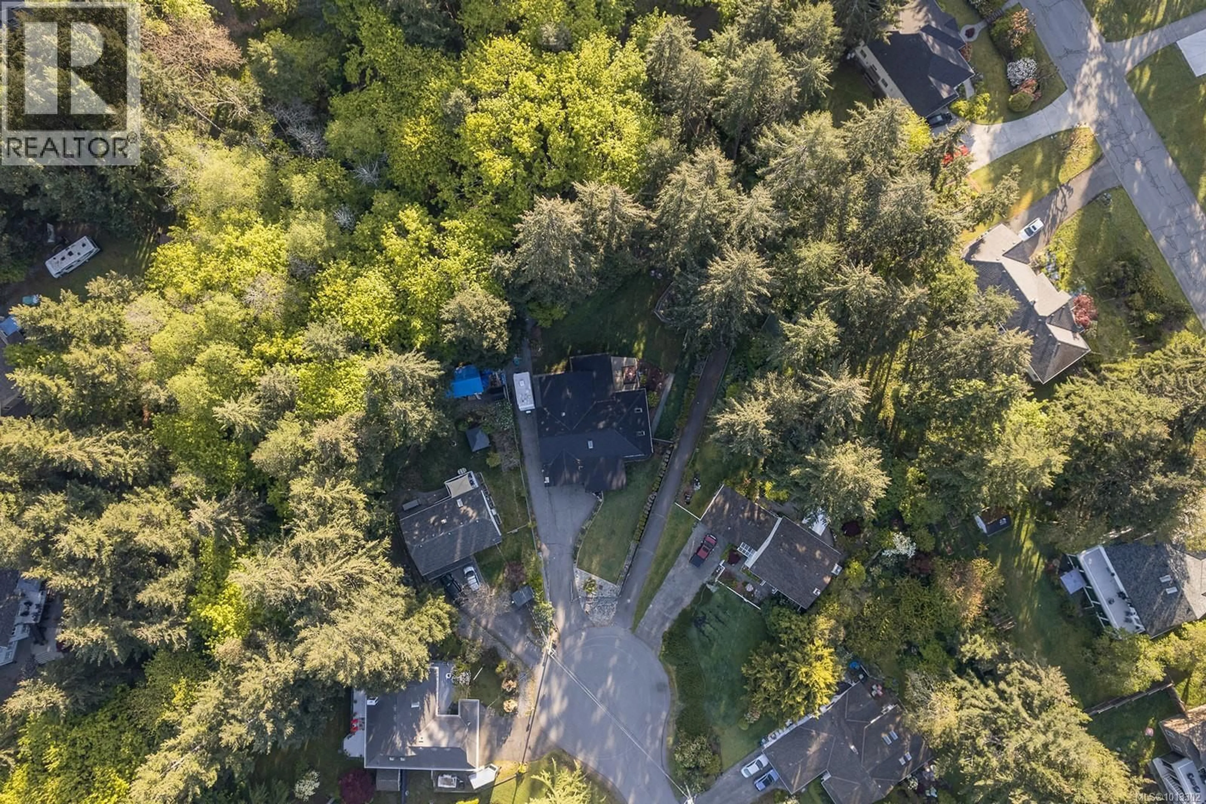 A pic from outside/outdoor area/front of a property/back of a property/a pic from drone, forest/trees view for 1220 MARGARET PLACE, Duncan British Columbia V9L5R6