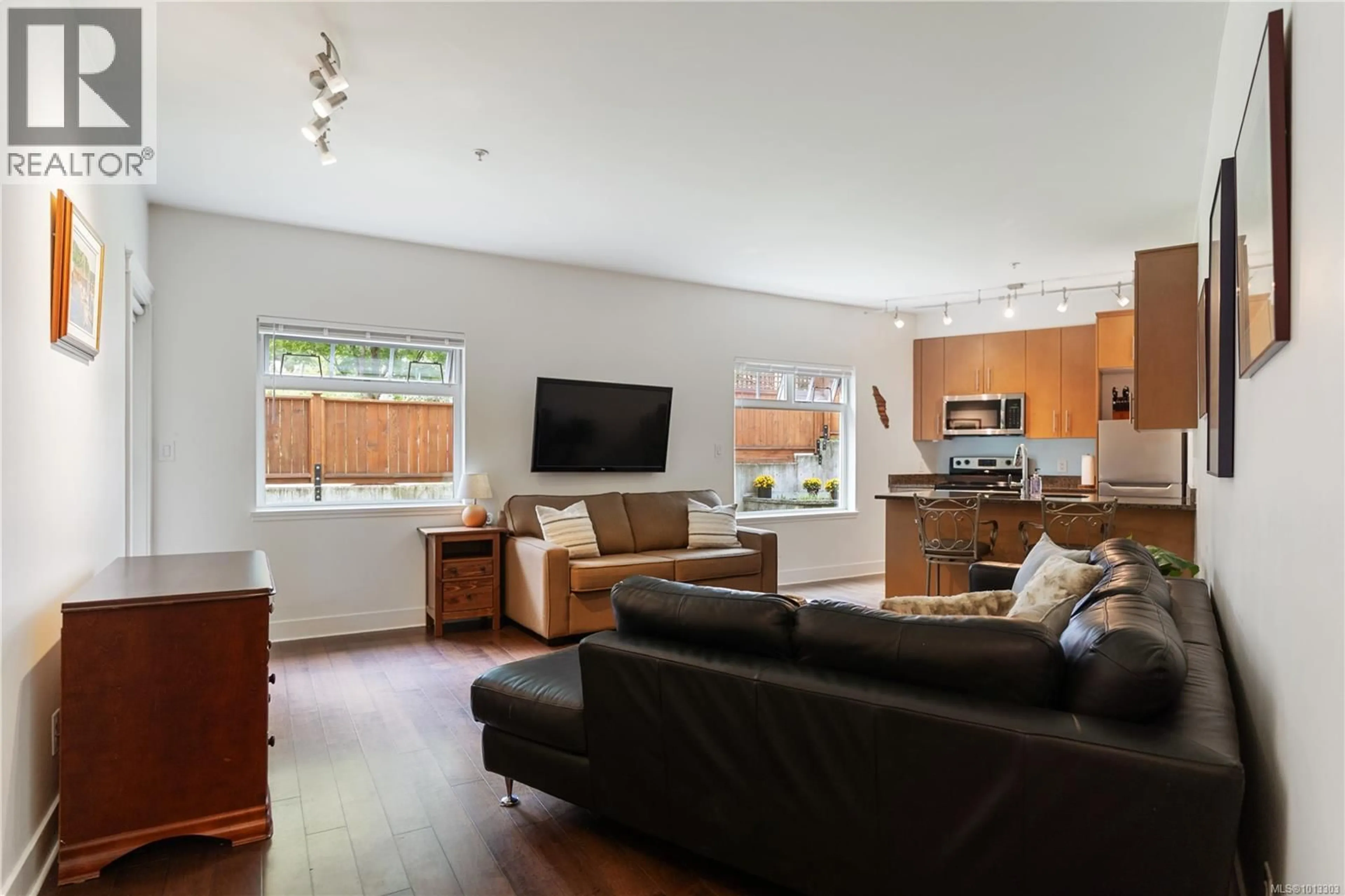 Living room with furniture, wood/laminate floor for 110 - 21 CONARD STREET, View Royal British Columbia V8Z0C4