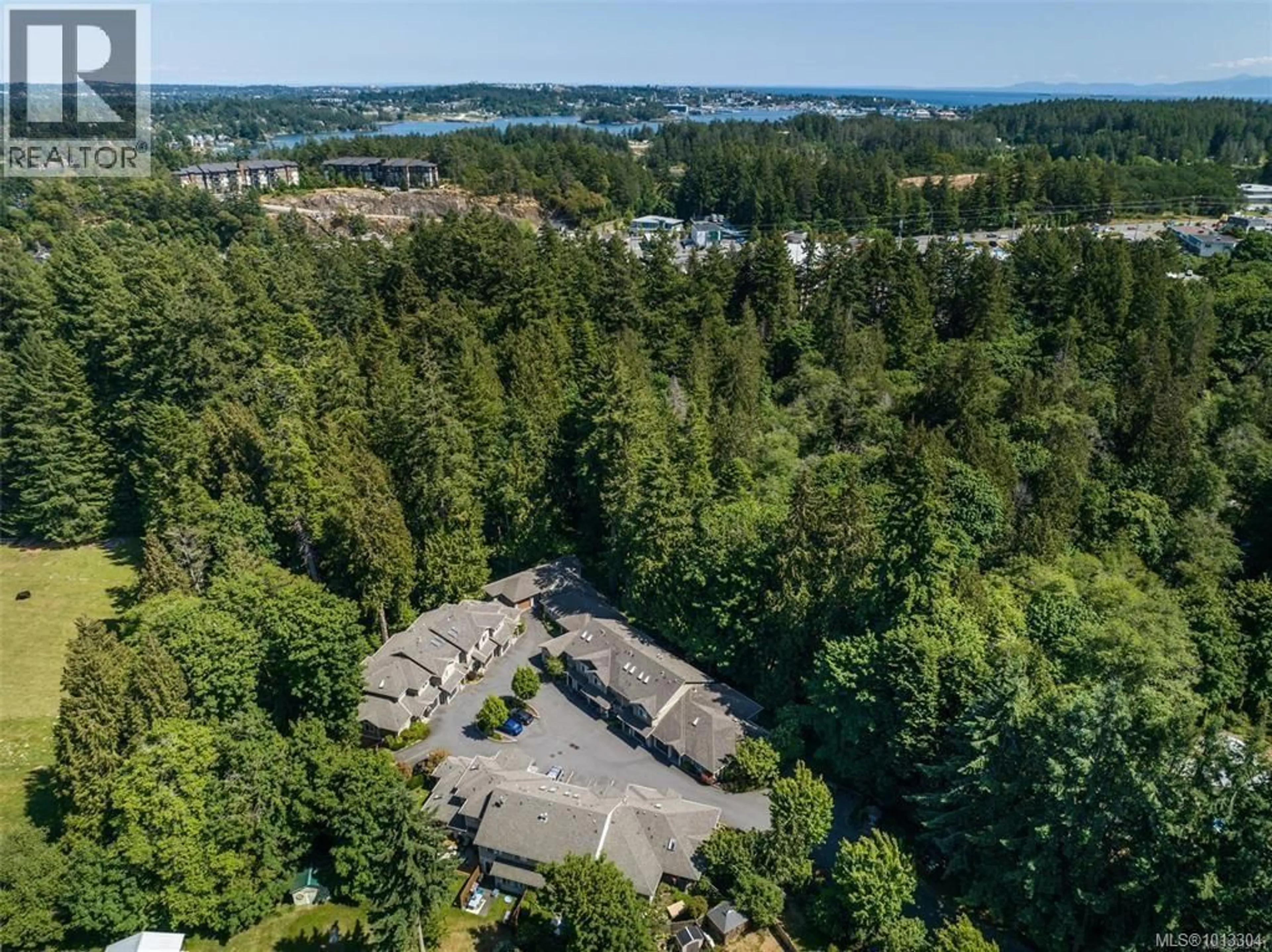 A pic from outside/outdoor area/front of a property/back of a property/a pic from drone, forest/trees view for 6 - 199 ATKINS ROAD, View Royal British Columbia V9B2Z9