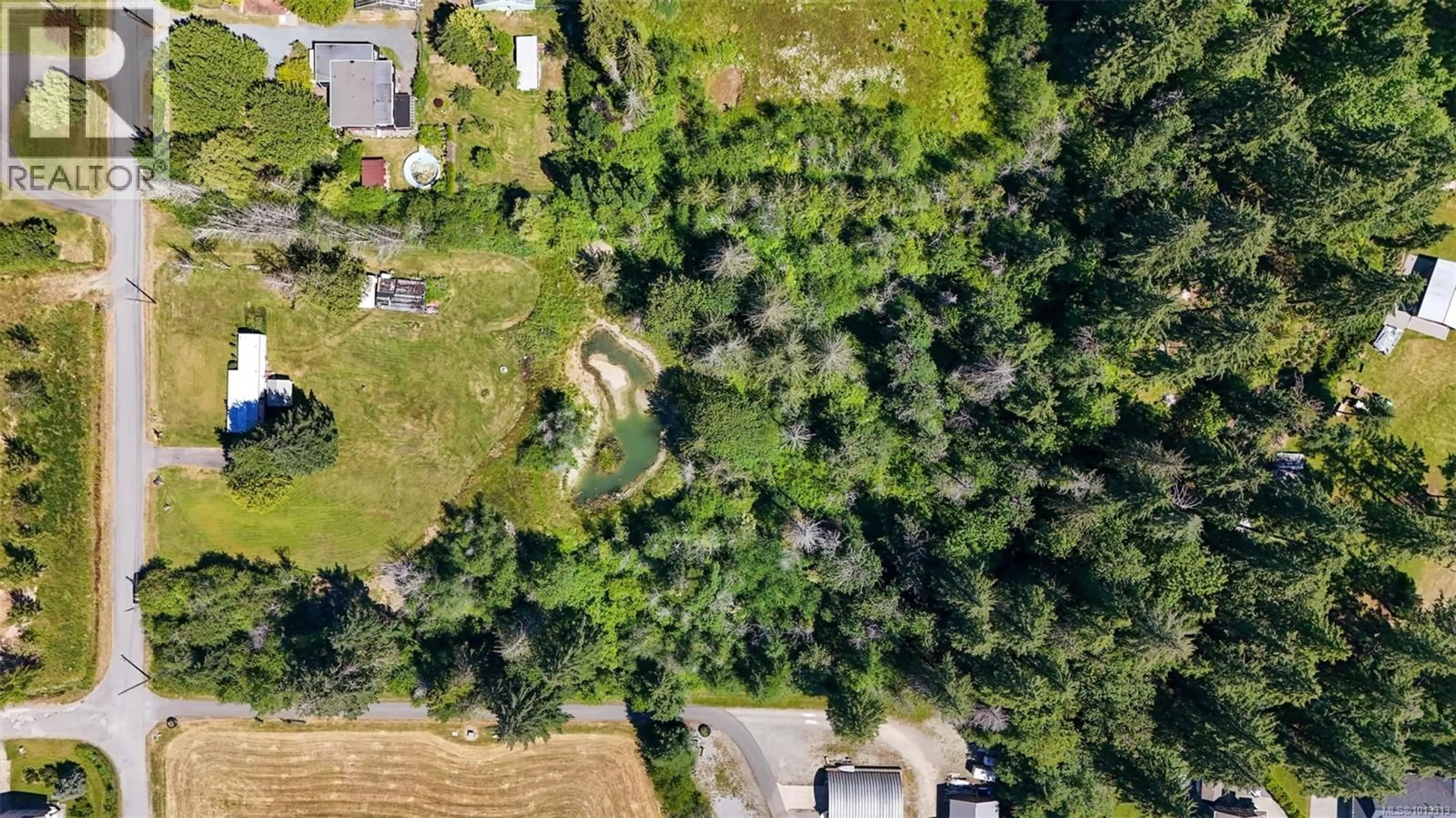 A pic from outside/outdoor area/front of a property/back of a property/a pic from drone, forest/trees view for 5611 STRICK ROAD, Port Alberni British Columbia V9Y8W4