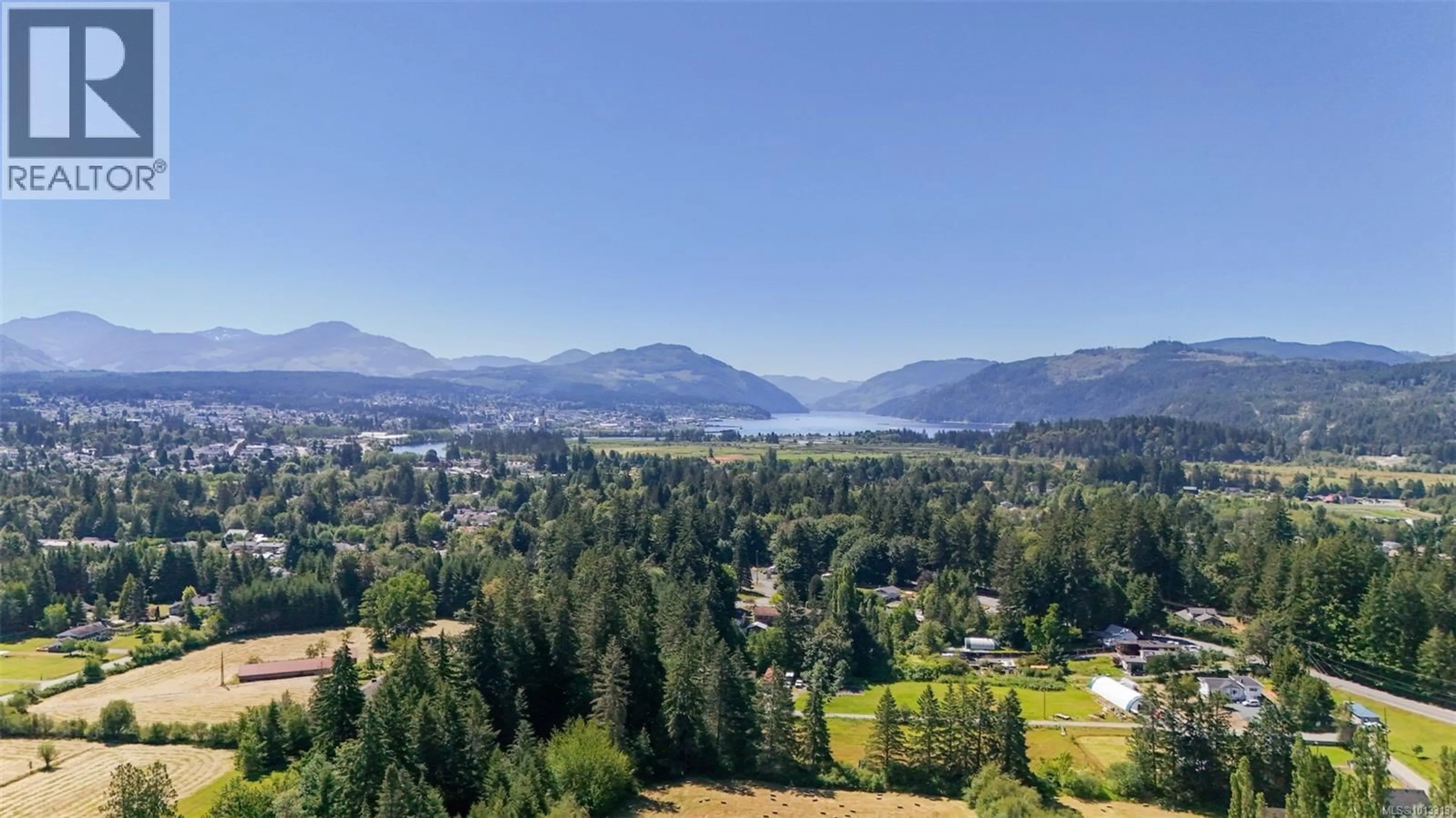 A pic from outside/outdoor area/front of a property/back of a property/a pic from drone, water/lake/river/ocean view for 5611 STRICK ROAD, Port Alberni British Columbia V9Y8W4