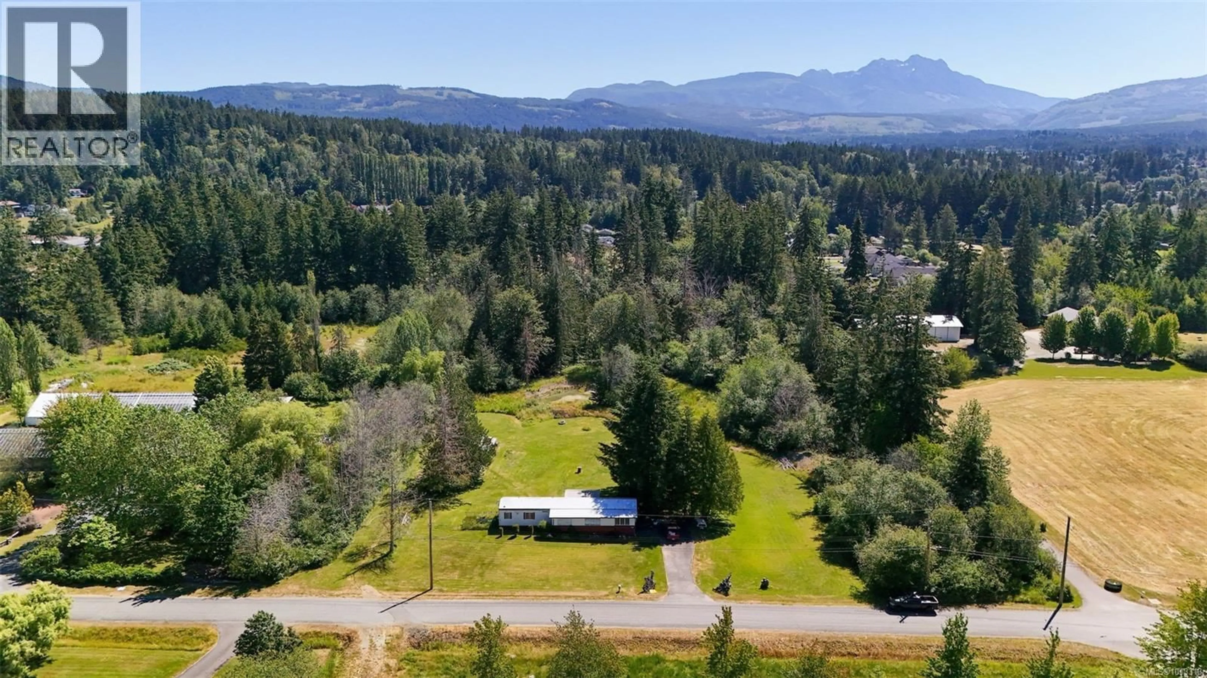 A pic from outside/outdoor area/front of a property/back of a property/a pic from drone, mountain view for 5611 STRICK ROAD, Port Alberni British Columbia V9Y8W4