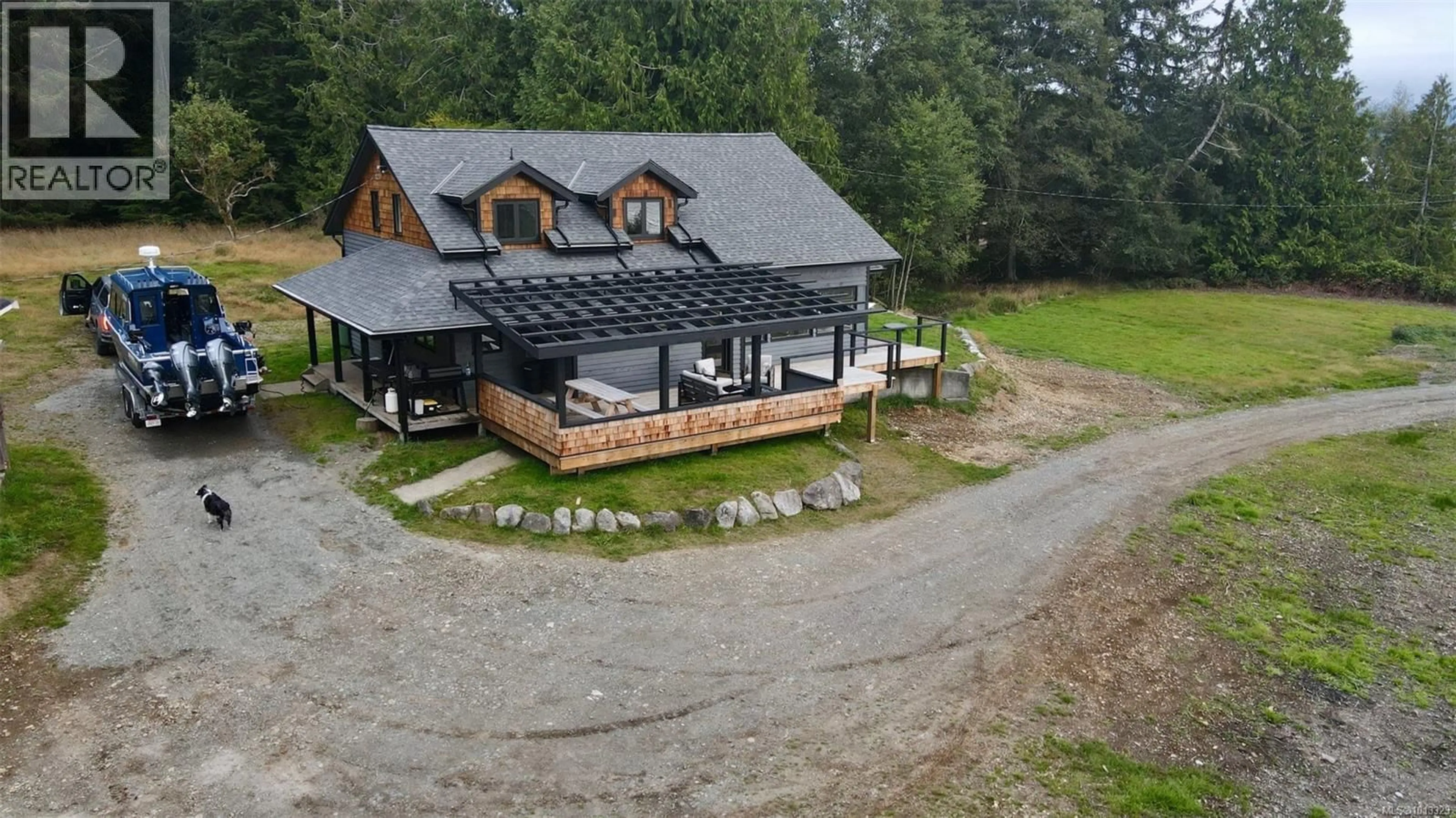 A pic from outside/outdoor area/front of a property/back of a property/a pic from drone, unknown for 305 KALEVA ROAD, Sointula British Columbia V0N3E0
