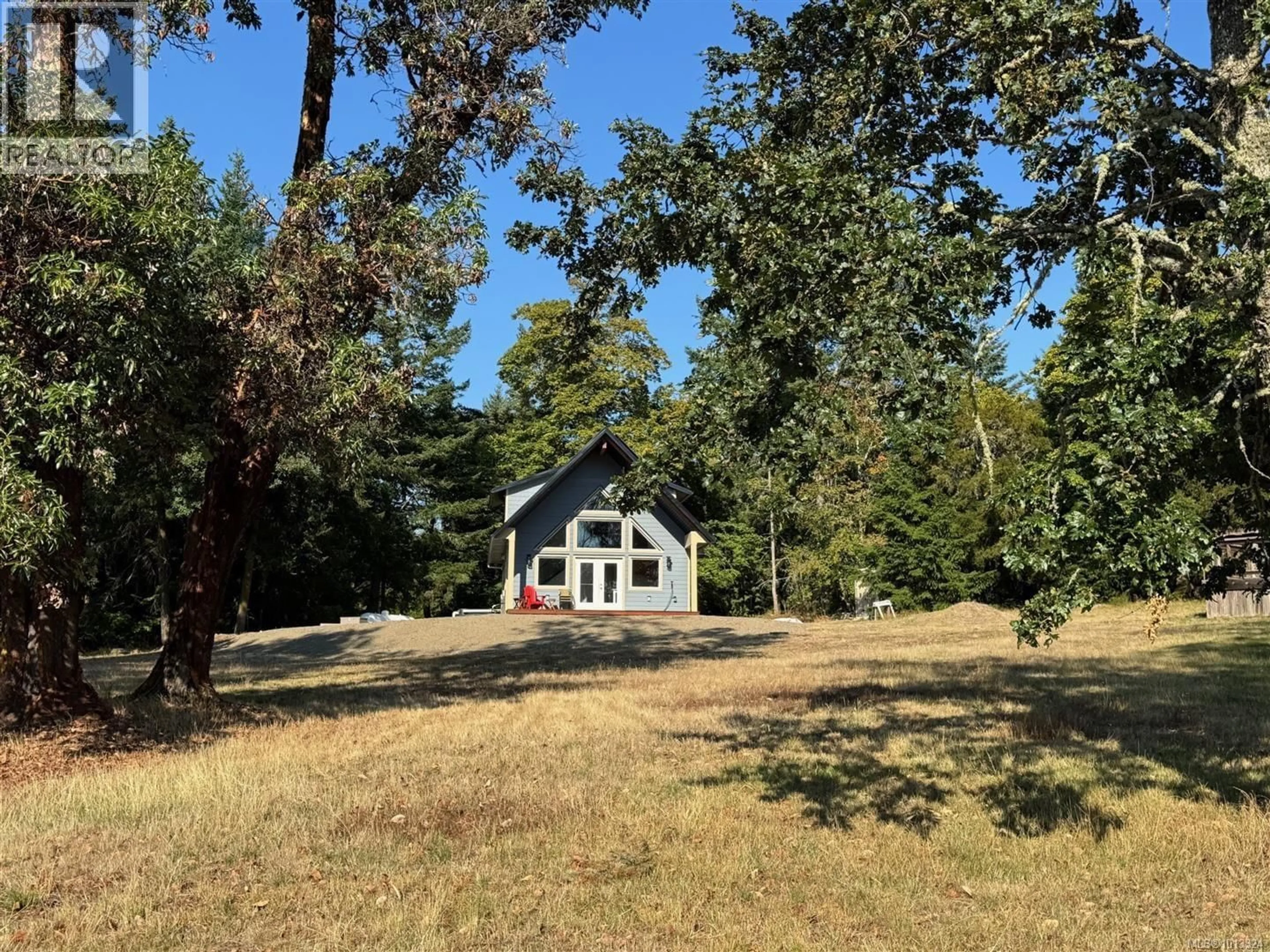 A pic from outside/outdoor area/front of a property/back of a property/a pic from drone, forest/trees view for SL94 - 313 EVERGREEN LANE, Sidney Island British Columbia V0N2G0