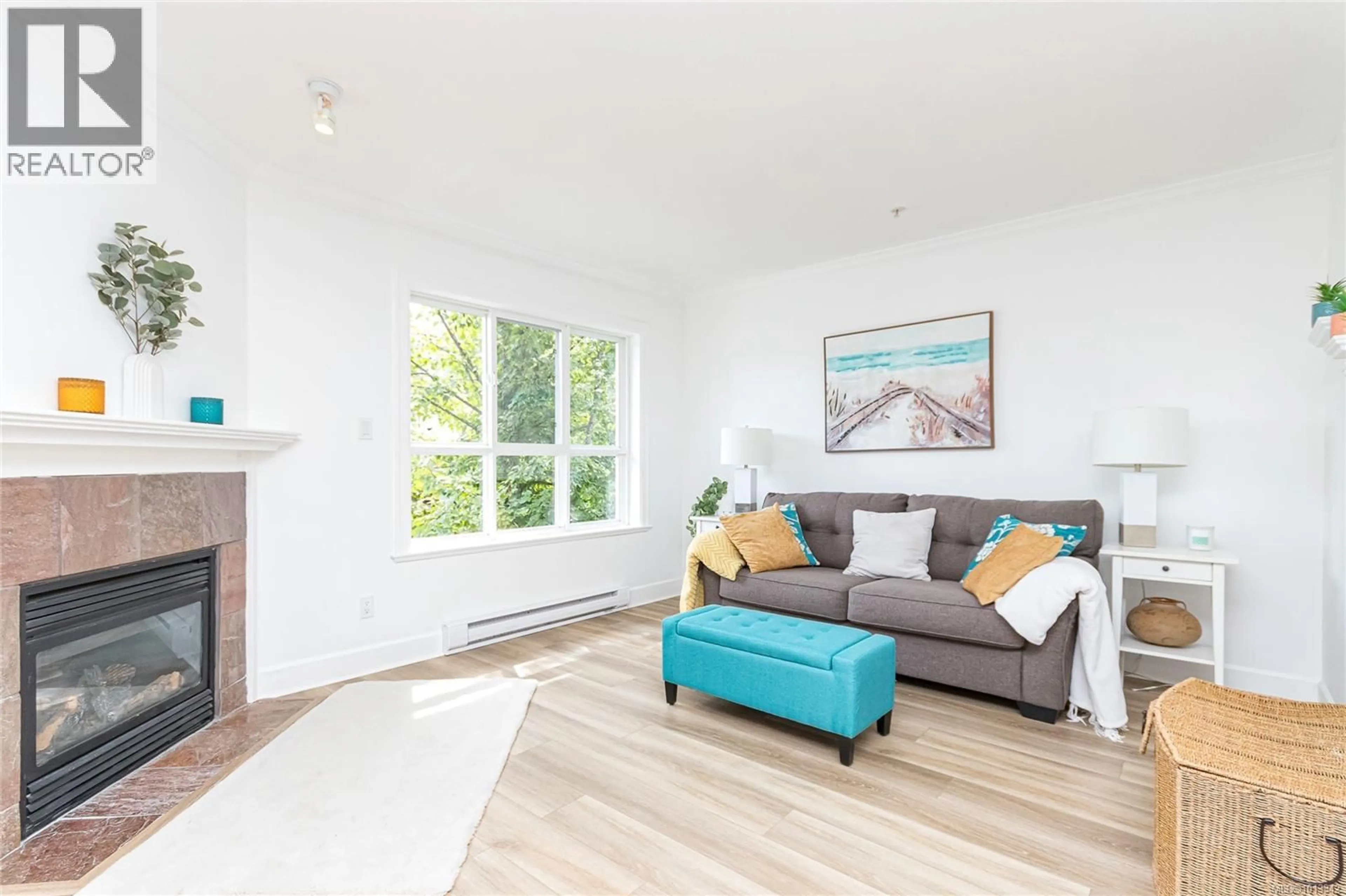 Living room with furniture, wood/laminate floor for 60 - 486 ROYAL BAY DRIVE, Colwood British Columbia V9C4L7