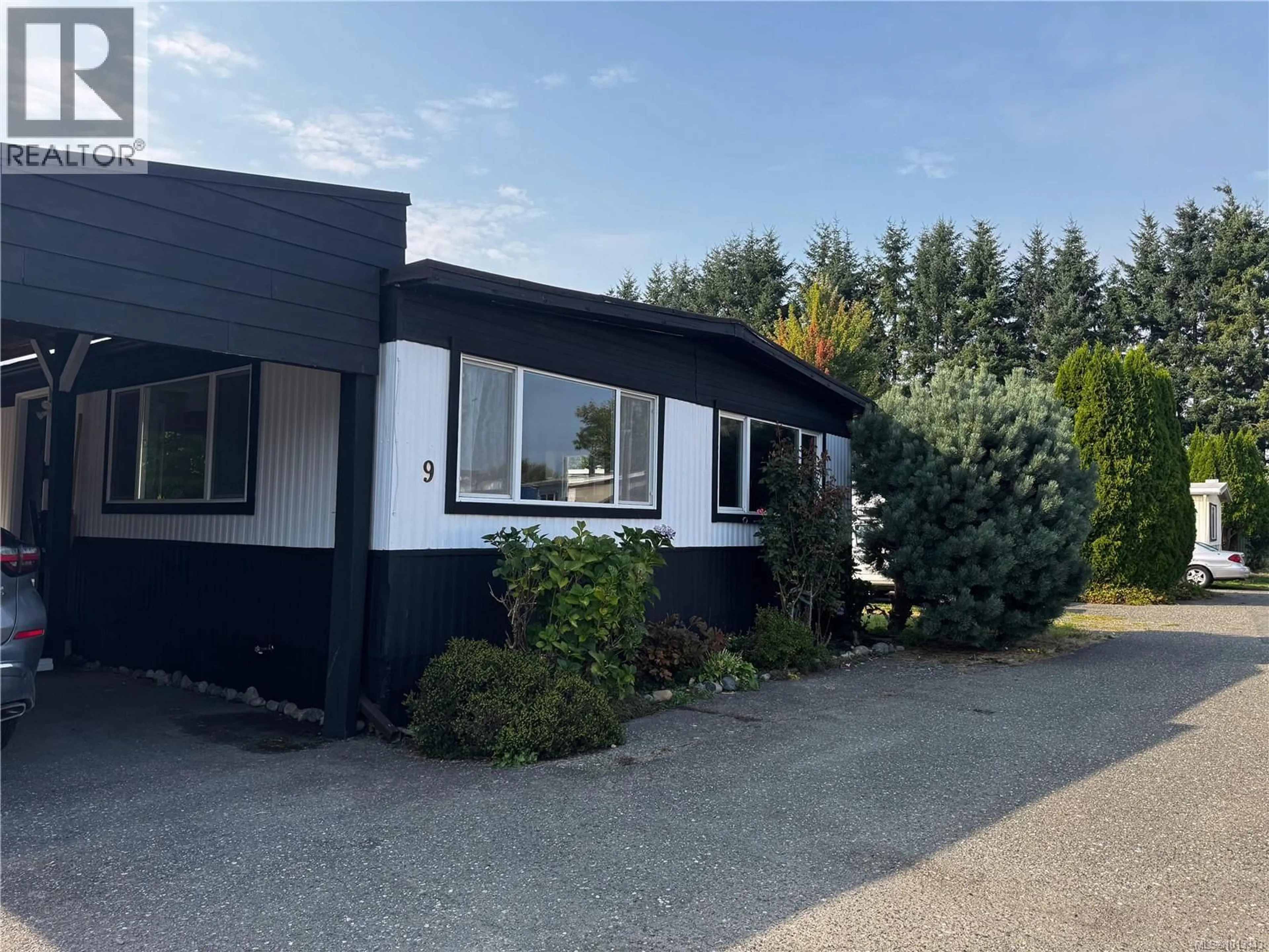 A pic from outside/outdoor area/front of a property/back of a property/a pic from drone, building for 9 - 1451 PERKINS ROAD, Campbell River British Columbia V9W4R8